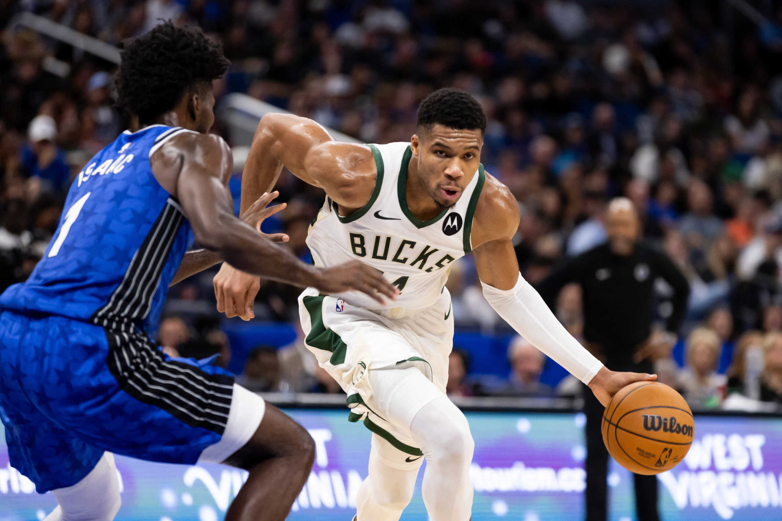 Nov 11, 2023; Orlando, Florida, USA; Milwaukee Bucks forward Giannis Antetokounmpo (34) drives to the basket against Orlando Magic forward Jonathan Isaac (1) during the second half at Amway Center. Mandatory Credit: Matt Pendleton-USA TODAY Sports
