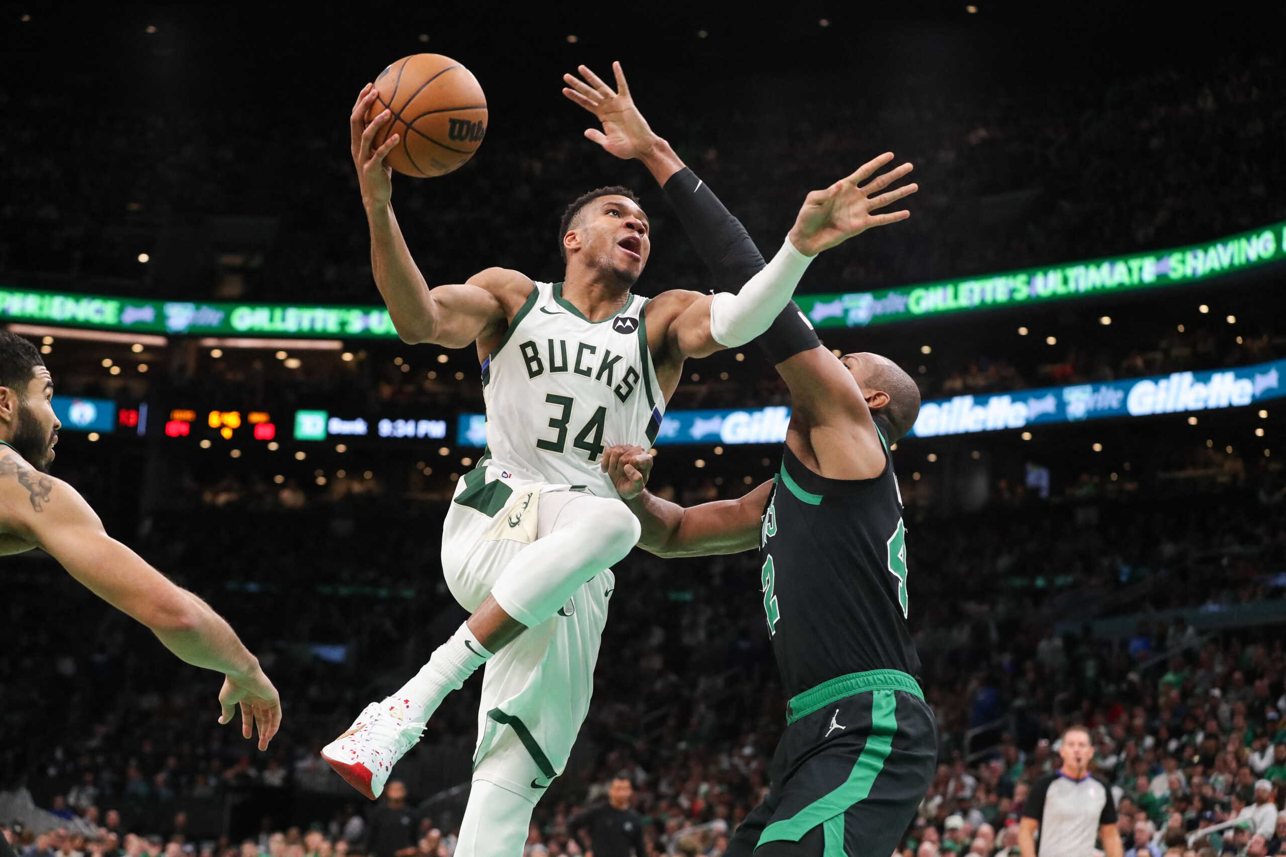 Nov 22, 2023; Boston, Massachusetts, USA; Milwaukee Bucks forward Giannis Antetokounmpo (34) shoots defended by Boston Celtics center Al Horford (42) at TD Garden. Mandatory Credit: Paul Rutherford-USA TODAY Sports