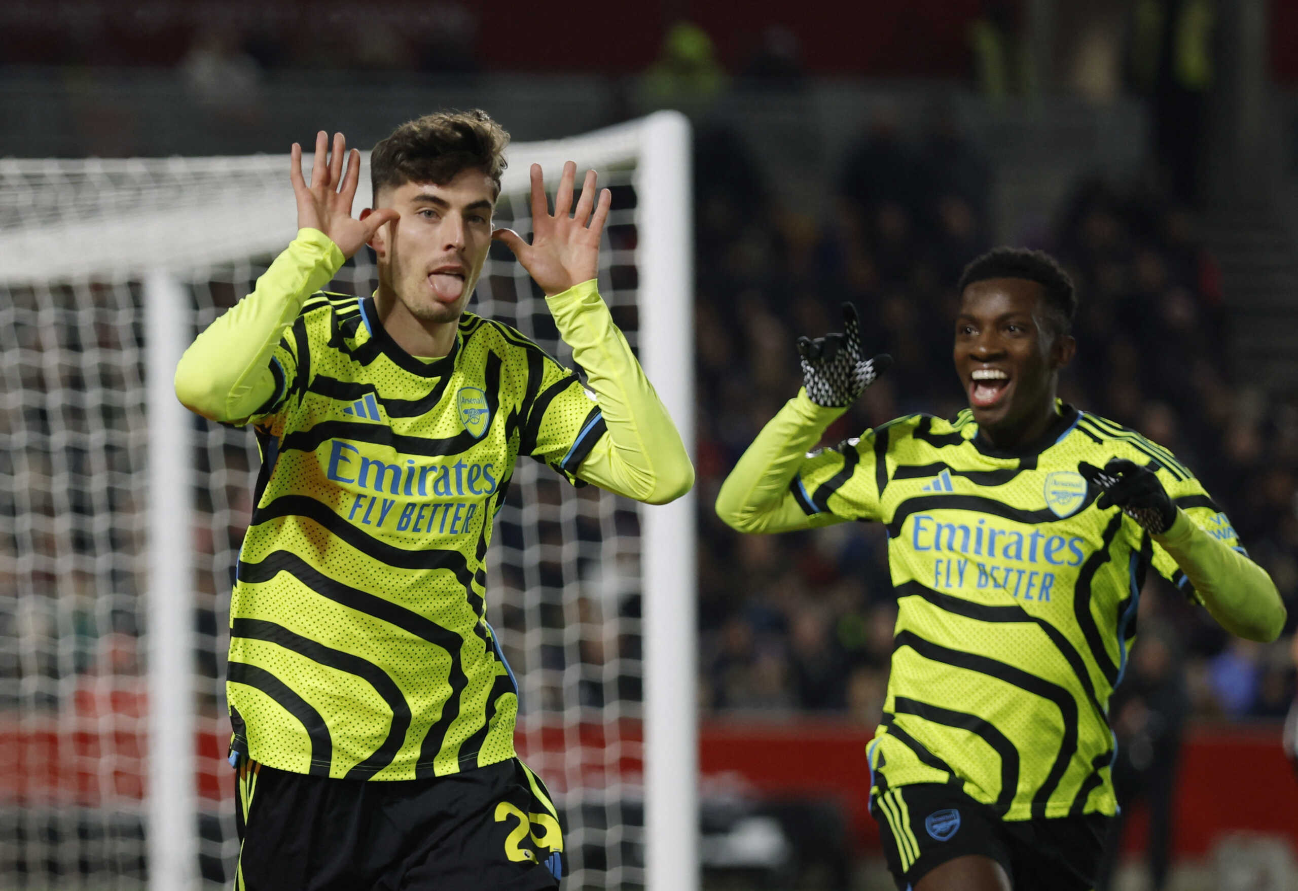 Soccer Football - Premier League - Brentford v Arsenal - Brentford Community Stadium, London, Britain - November 25, 2023 Arsenal's Kai Havertz celebrates scoring their first goal with teammate Eddie Nketiah Action Images via Reuters