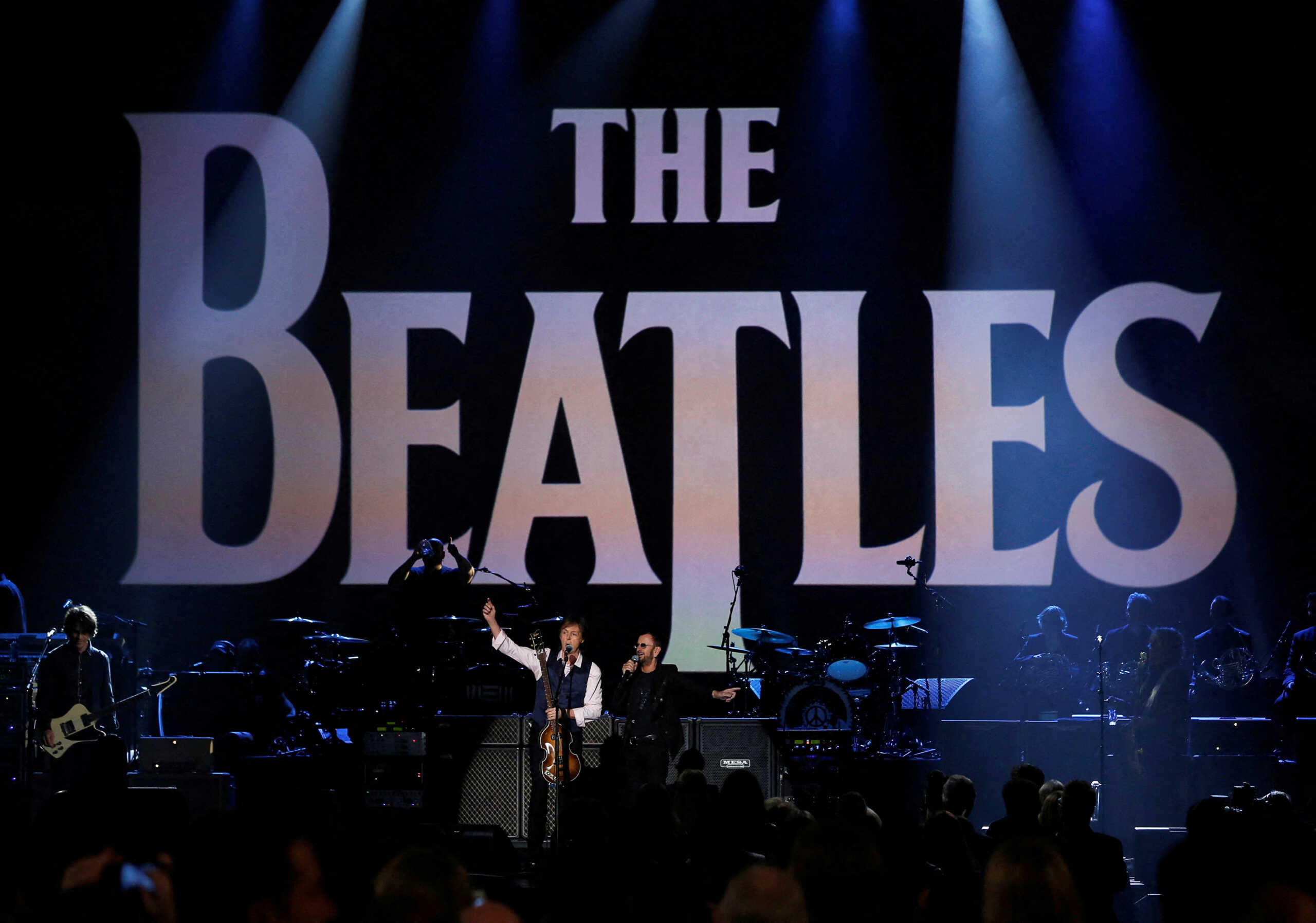 FILE PHOTO: Paul McCartney (L) and Ringo Starr perform during the taping of "The Night That Changed America: A GRAMMY Salute To The Beatles", which commemorates the 50th anniversary of The Beatles appearance on the Ed Sullivan Show, in Los Angeles January 27, 2014.   REUTERS