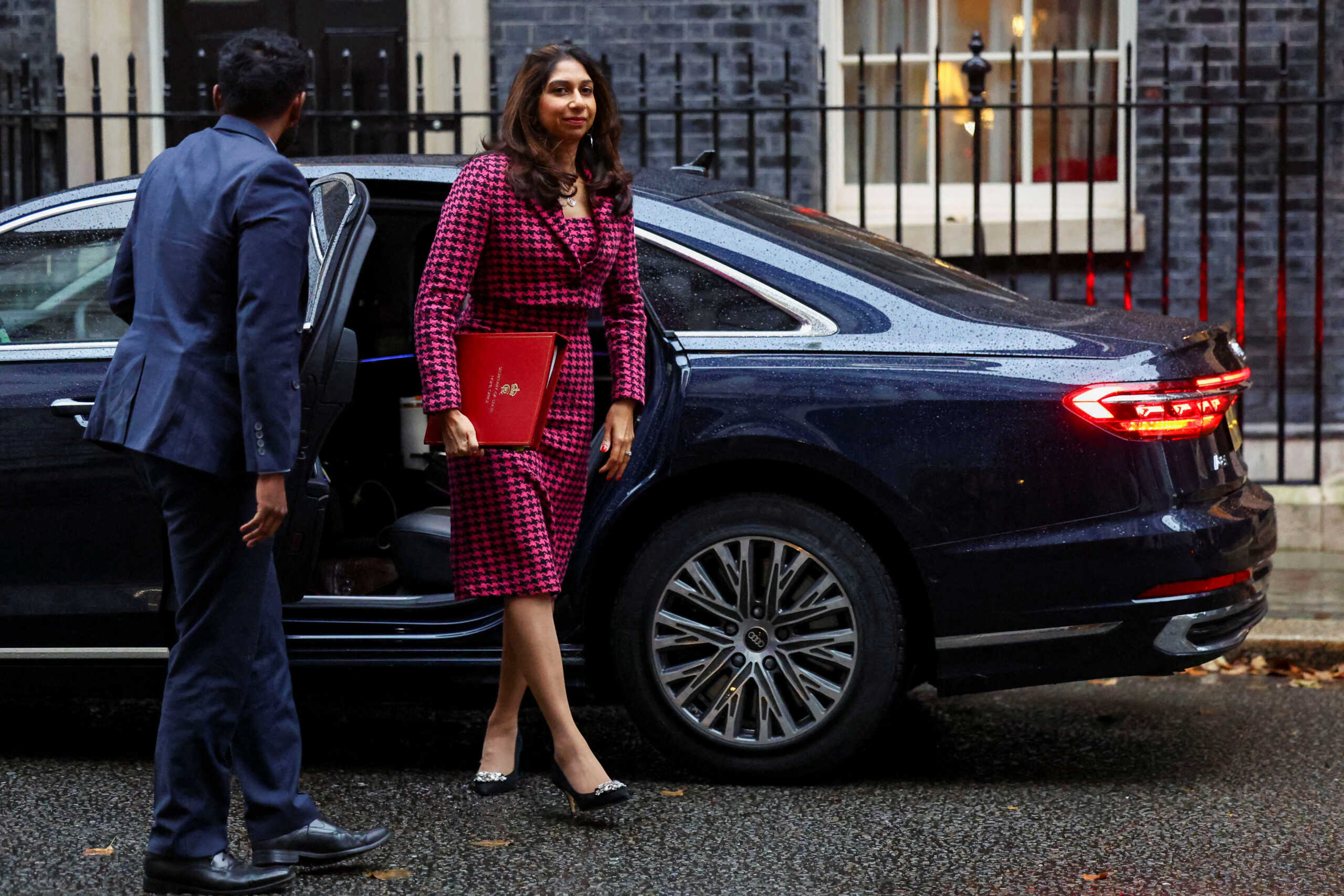 FILE PHOTO: Britain's Home Secretary Suella Braverman walks outside Number 10 Downing Street, in London, Britain, October 24, 2023. REUTERS