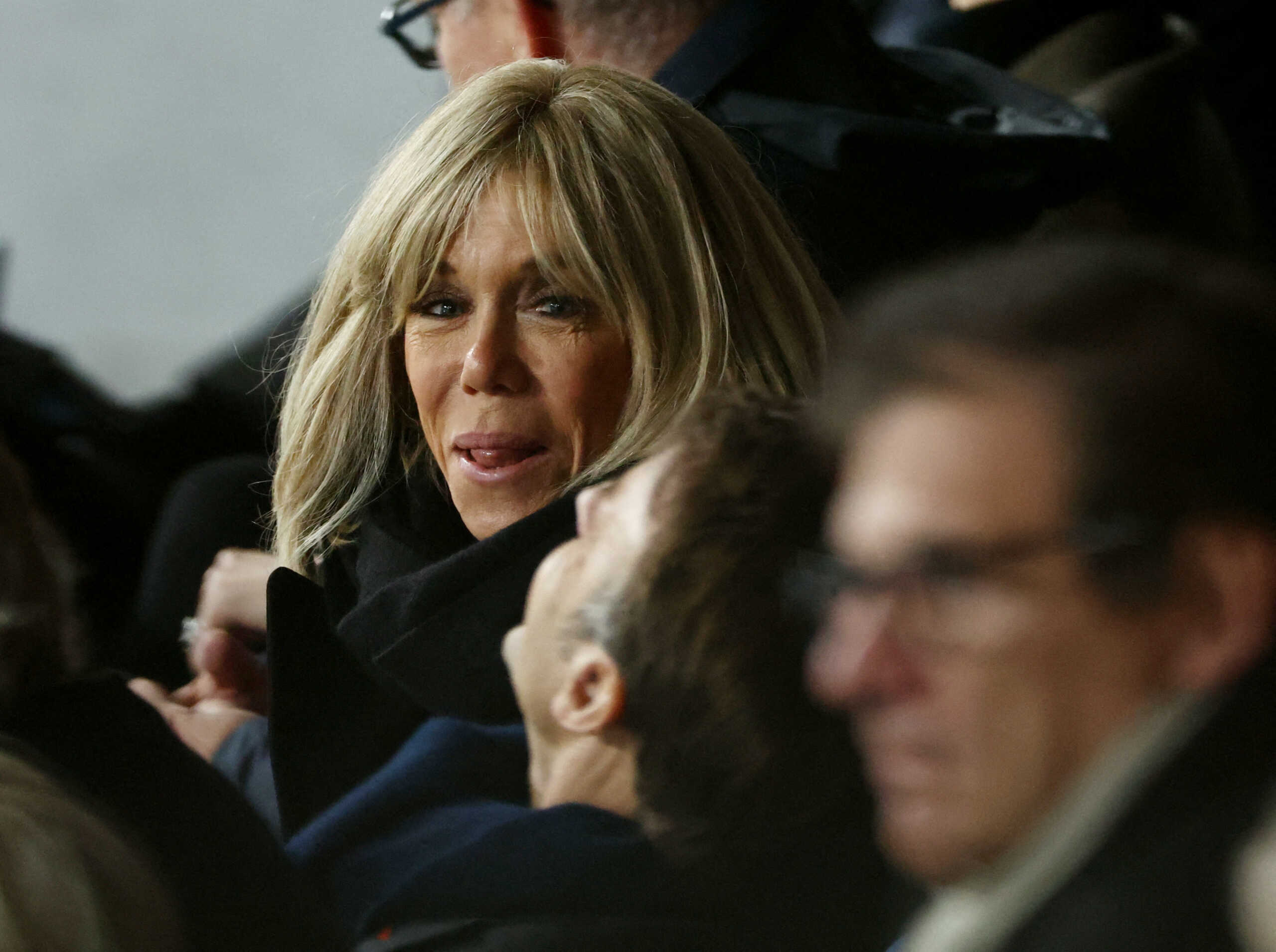 Rugby Union - Rugby World Cup 2023 - Final - New Zealand v South Africa - Stade de France, Saint-Denis, France - October 28, 2023 Brigitte Macron is seen sitting alongside husband and French President Emmanuel Macron in the stands during the match REUTERS