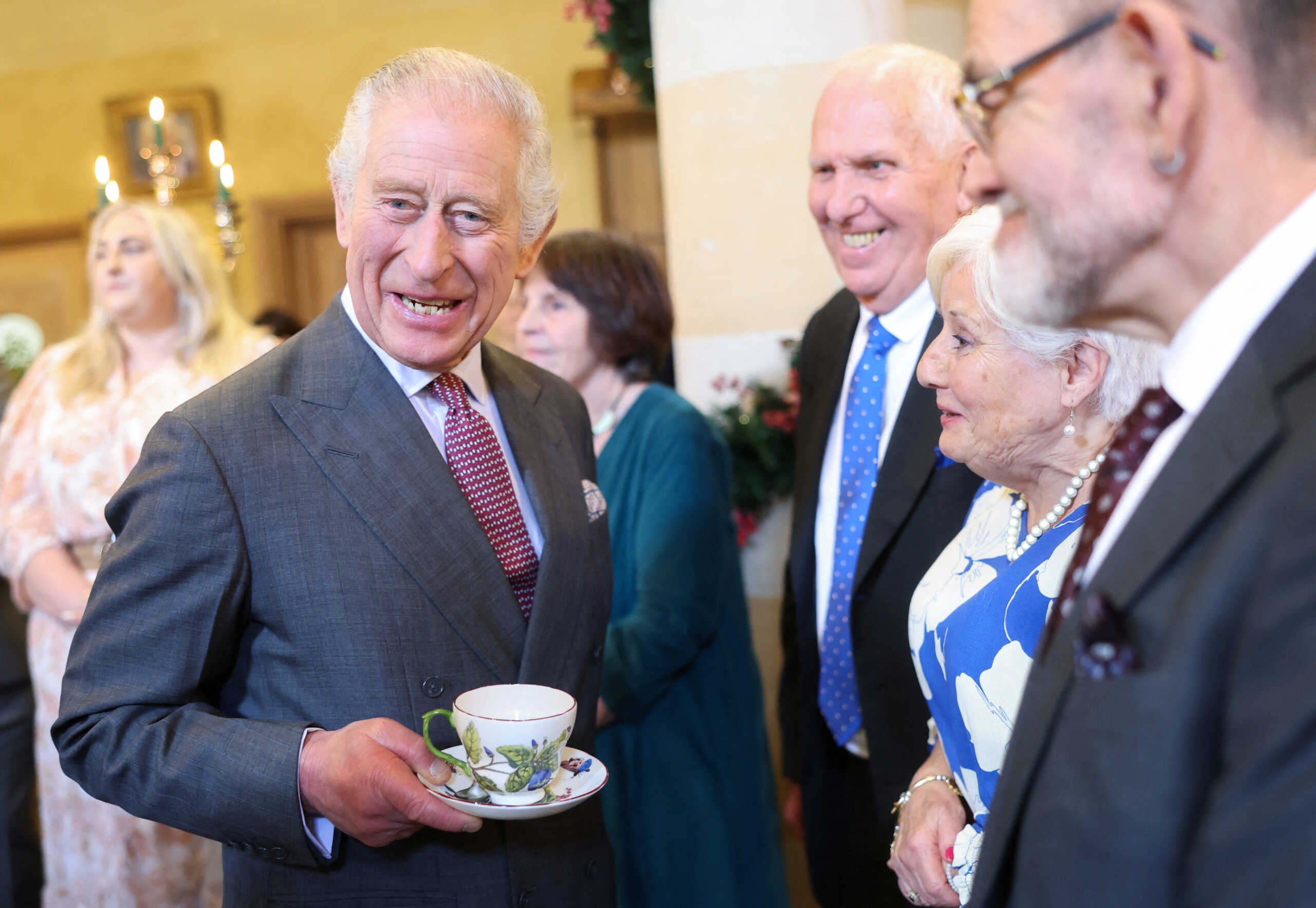 King Charles III's laughs as he attends his 75th birthday party hosted by the Prince's Foundation at Highgrove House on November 13, 2023 in Tetbury, England. Guests include local residents who have been nominated by friends and family and individuals and organisations also turning 75 in 2023.     Chris Jackson