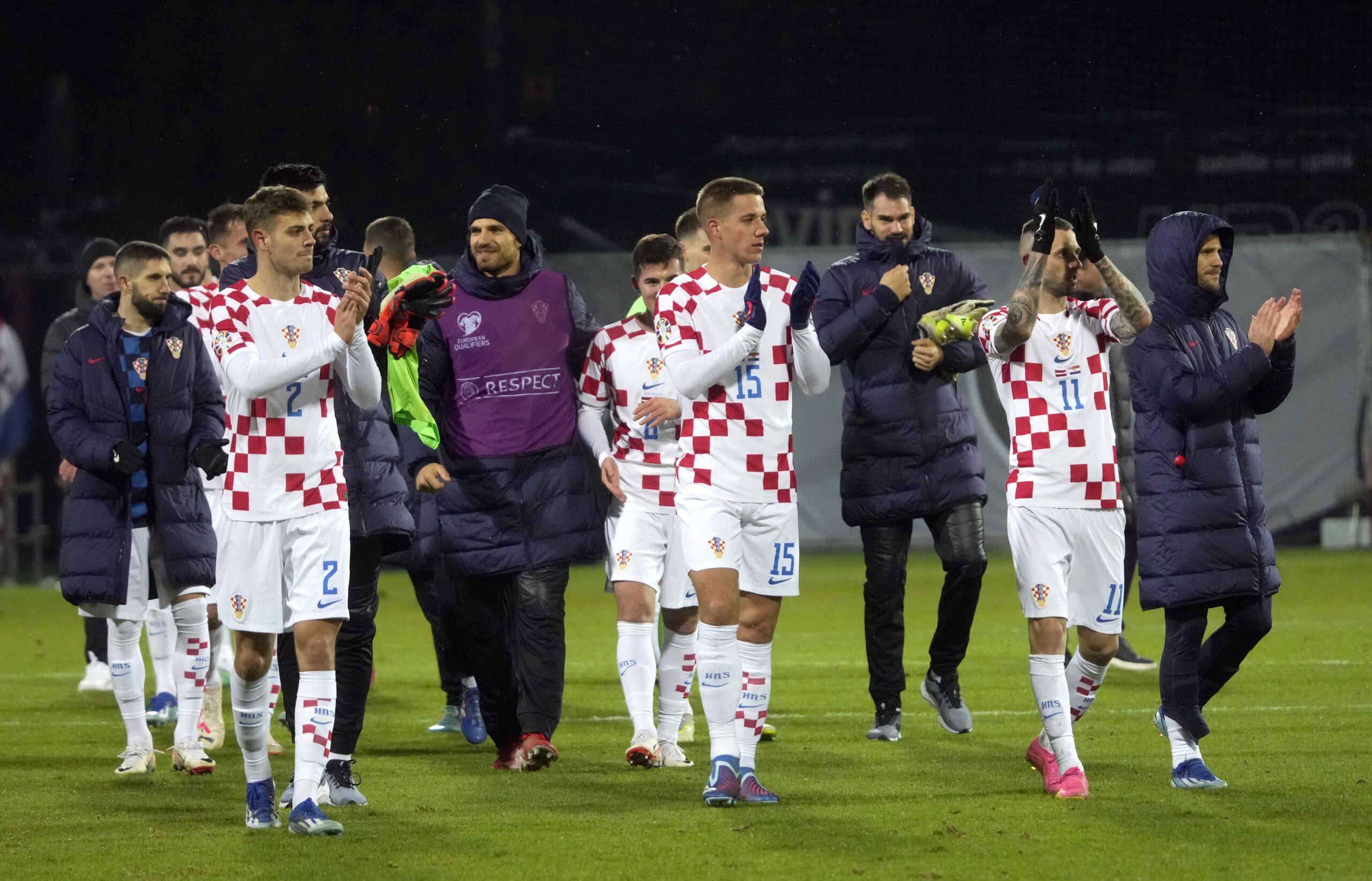 Soccer Football - Euro 2024 Qualifier - Group D - Latvia v Croatia - Skonto Stadium, Riga, Latvia - November 18, 2023 Croatia's Josip Stanisic, Mario Pasalic and Marcelo Brozovic celebrate after the match REUTERS