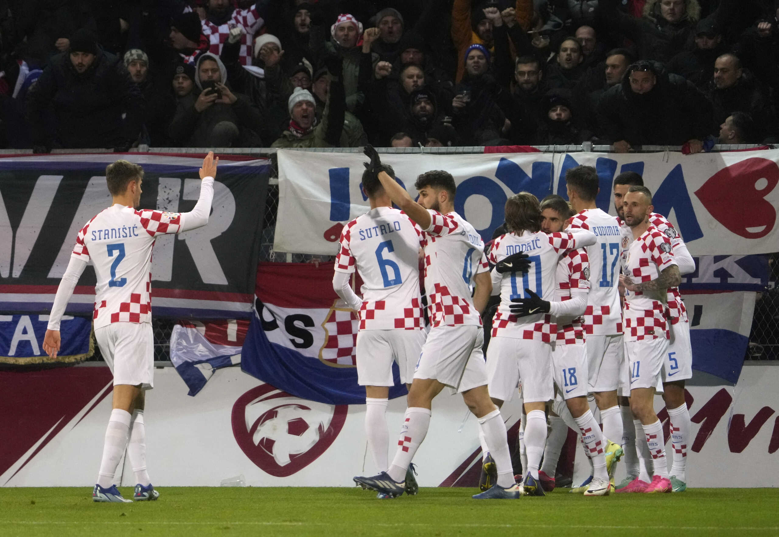 Soccer Football - Euro 2024 Qualifier - Group D - Latvia v Croatia - Skonto Stadium, Riga, Latvia - November 18, 2023 Croatia's Lovro Majer celebrates scoring their first goal with teammates REUTERS