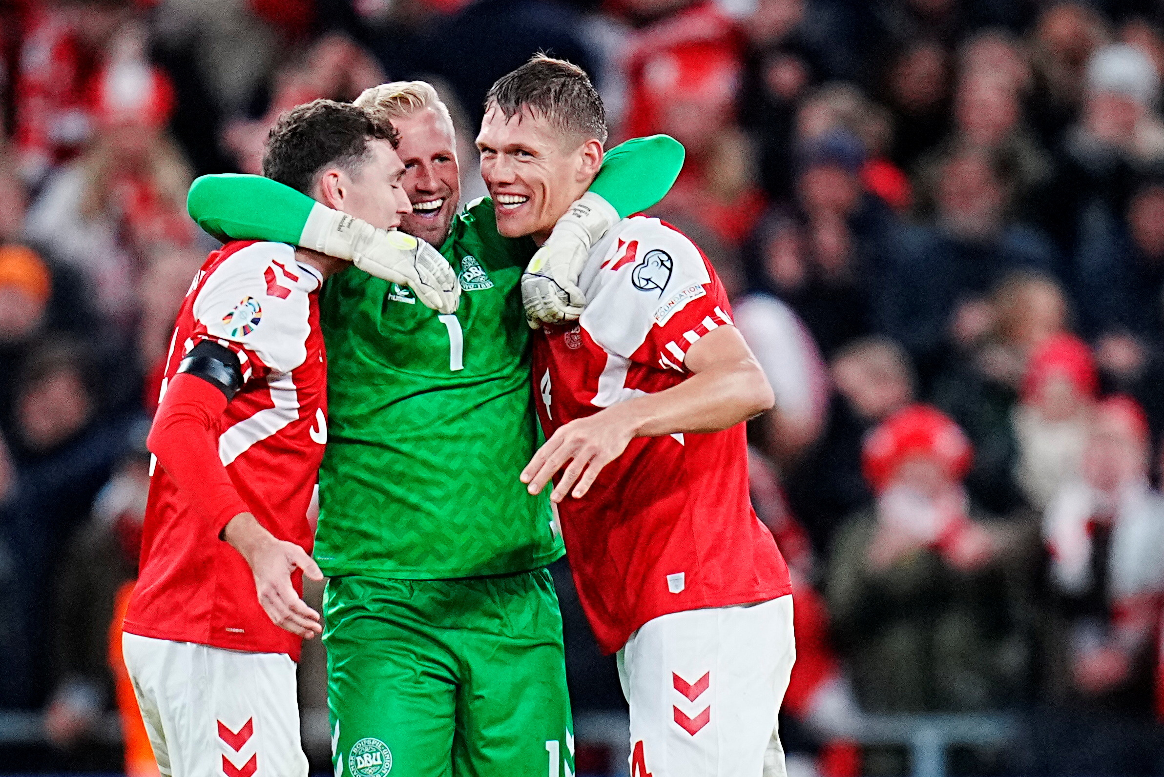 Soccer Football - UEFA Euro 2024 Qualifier - Group H - Denmark v Slovenia - Parken Stadium, Copenhagen, Denmark - November 17, 2023 Denmark's Andreas Christensen, Kasper Schmeichel and Jannik Vestergaard celebrate after the match  Liselotte Sabroe