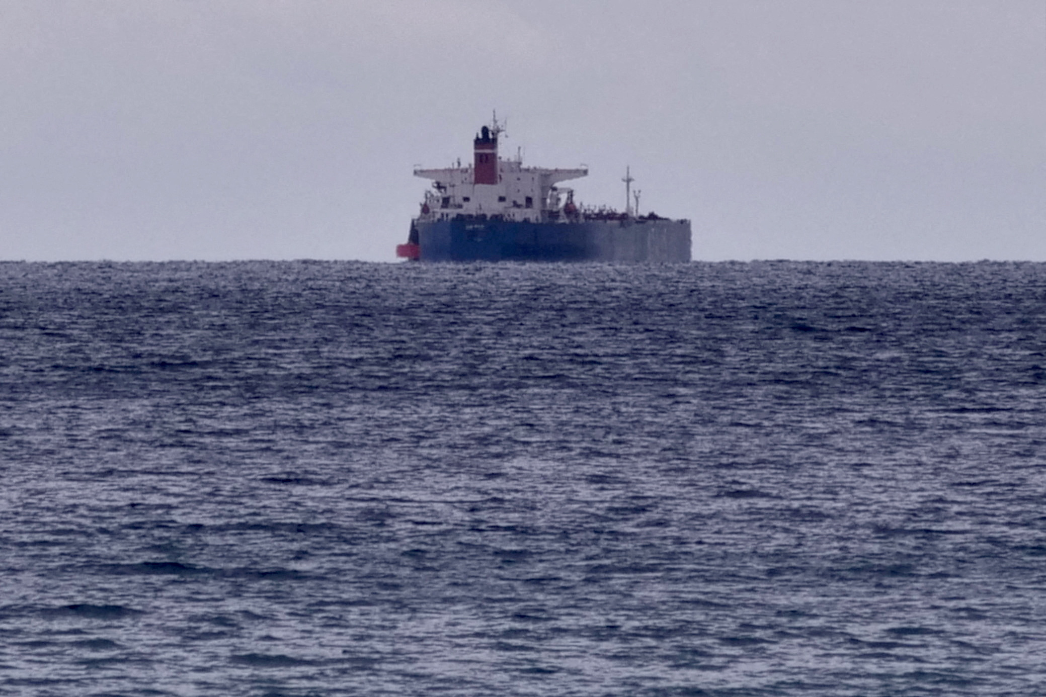 FILE PHOTO: The seized Russian-flagged oil tanker Pegas is seen anchored off the shore of Karystos, on the Island of Evia, Greece, April 19, 2022. REUTERS