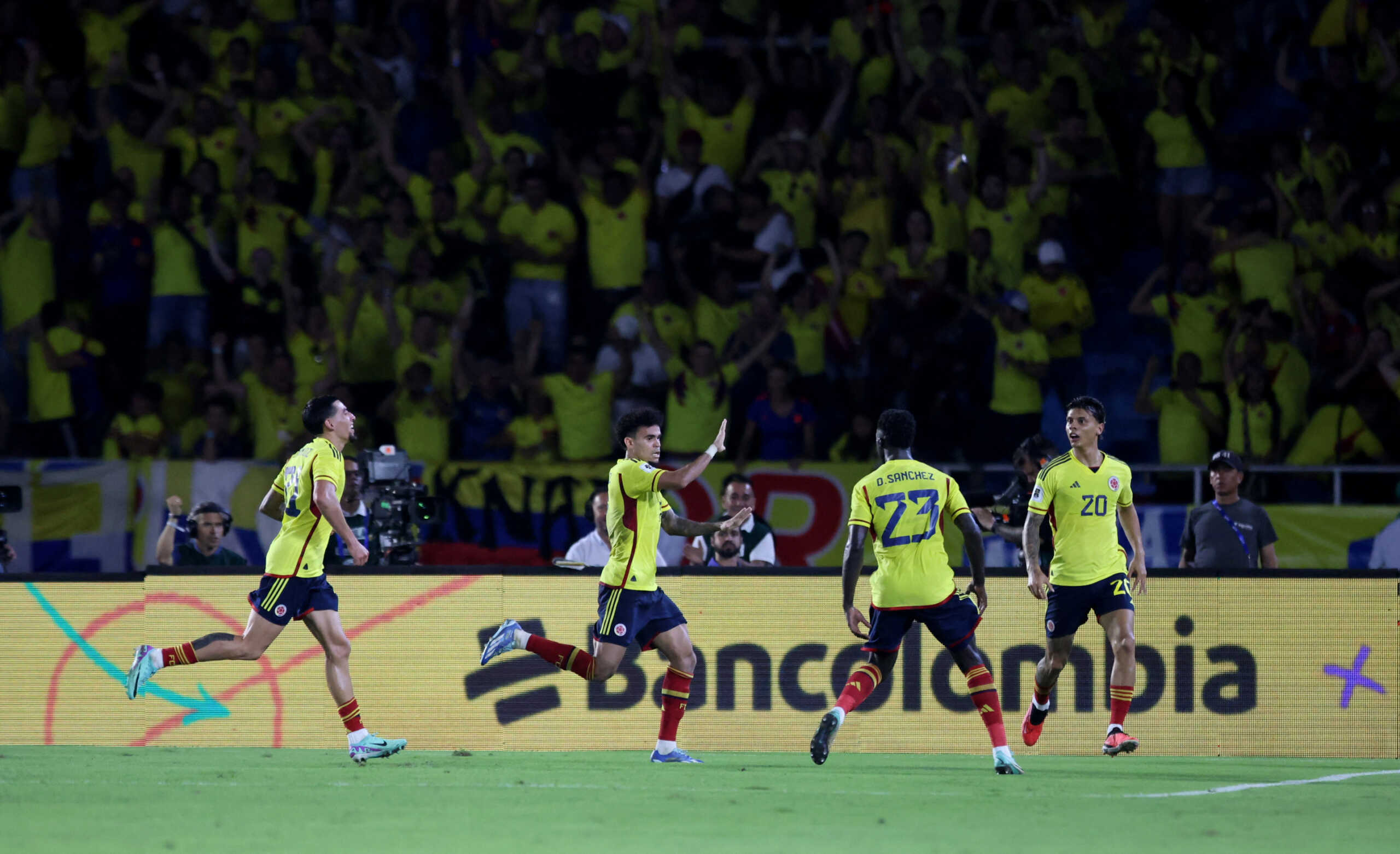 Soccer Football - World Cup - South American Qualifiers - Colombia v Brazil - Estadio Metropolitano Roberto Melendez, Barranquilla, Colombia - November 16, 2023 Colombia's Luis Diaz celebrates scoring their first goal with teammates REUTERS