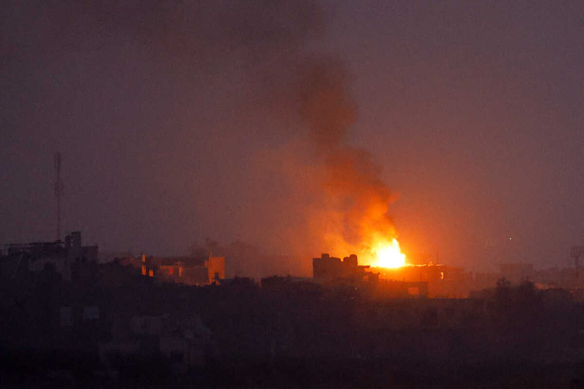 Fire burns after an explosion in north Gaza, as seen from southern Israel, amid the ongoing conflict between Israel and the Palestinian group Hamas, November 23, 2023. REUTERS