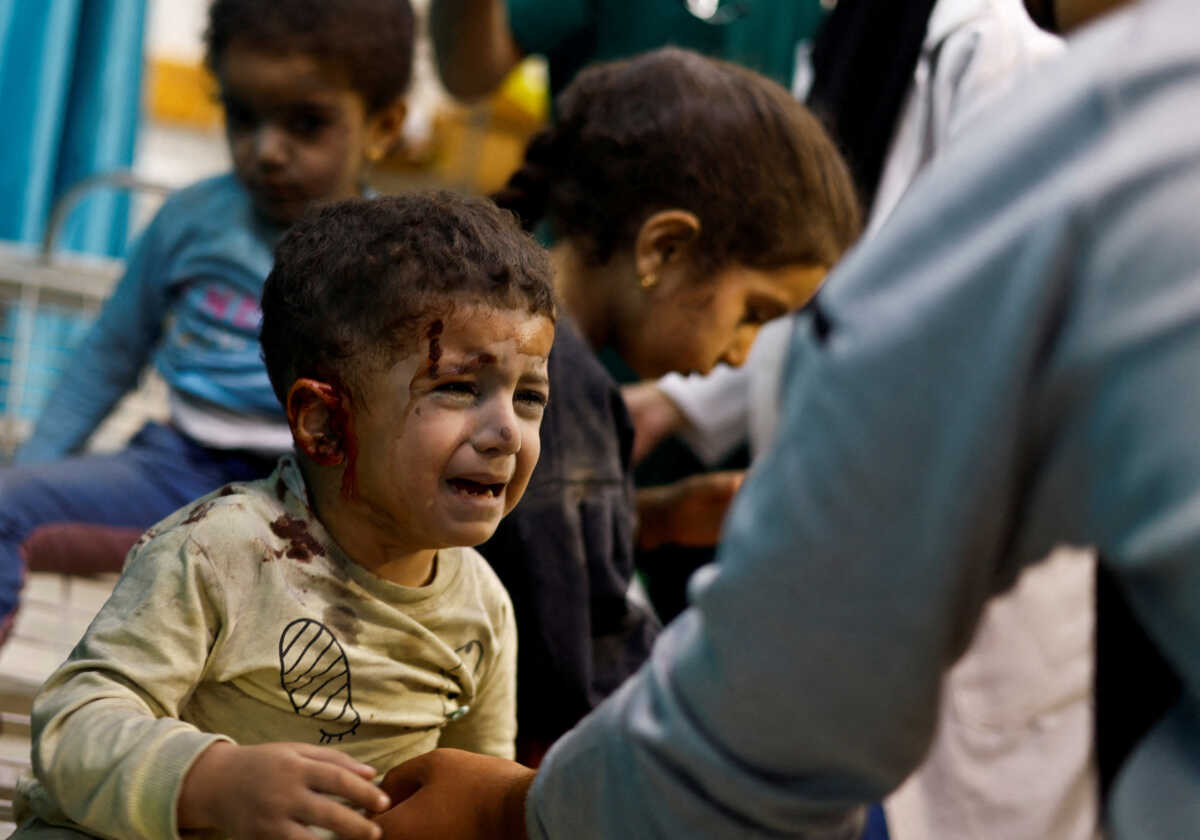Palestinian children wounded in Israeli strikes amid the ongoing conflict between Israel and Palestinian group Hamas wait to receive treatment at Nasser hospital in Khan Younis in the southern Gaza Strip November 12, 2023. REUTERS