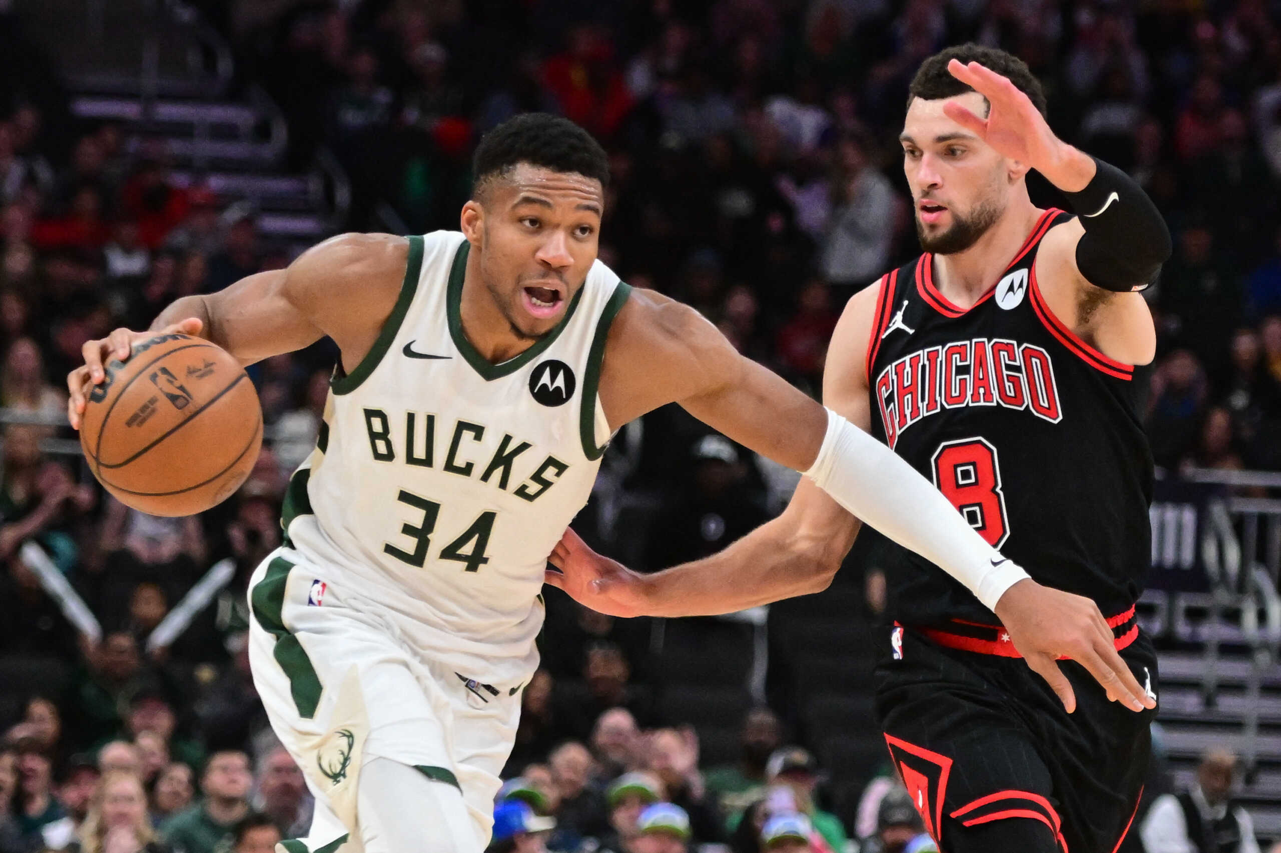 Nov 13, 2023; Milwaukee, Wisconsin, USA; Milwaukee Bucks forward Giannis Antetokounmpo (34) drives to the basket against Chicago Bulls guard Zach LaVine (8) in the fourth quarter at Fiserv Forum. Mandatory Credit: Benny Sieu-USA TODAY Sports