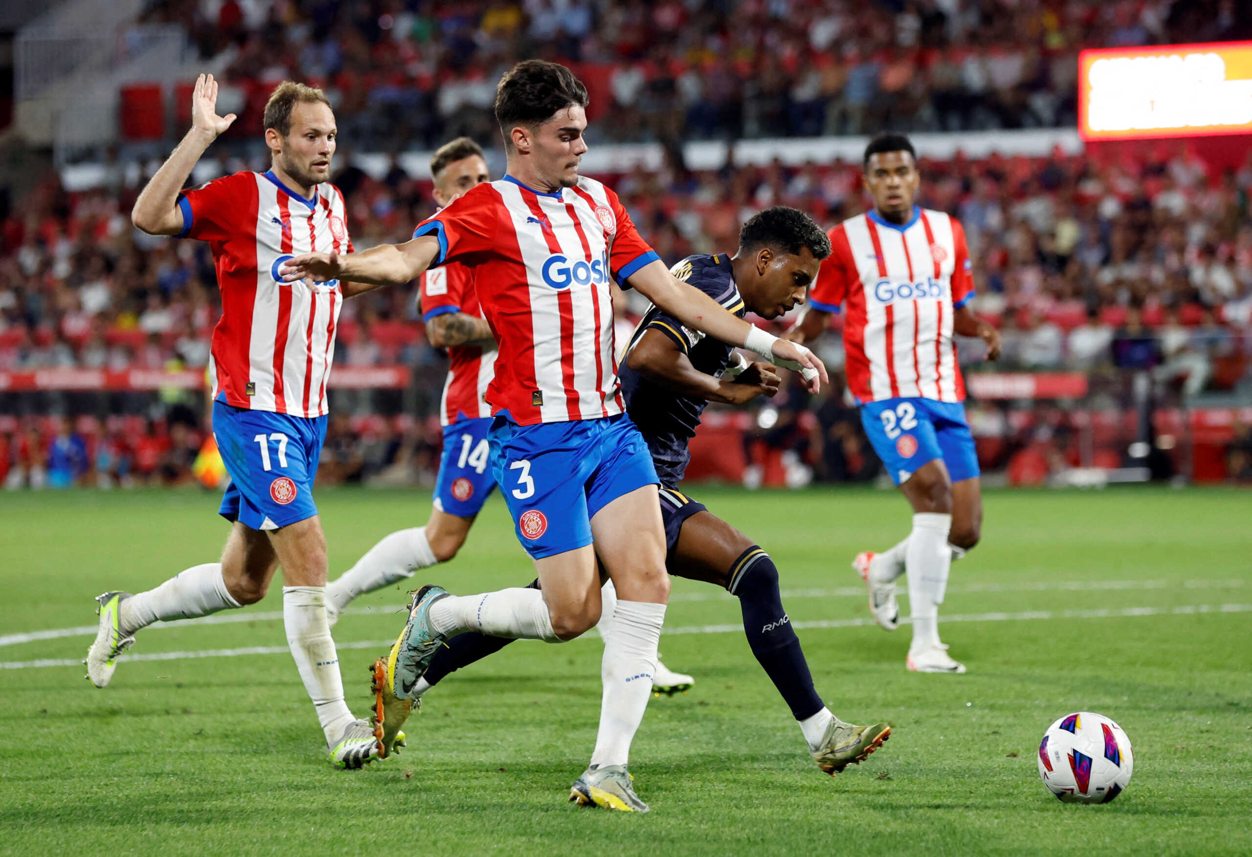 FILE PHOTO: Soccer Football - LaLiga - Girona v Real Madrid - Estadi Montilivi, Girona, Spain - September 30, 2023 Real Madrid's Rodrygo in action with Girona's Miguel Gutierrez REUTERS