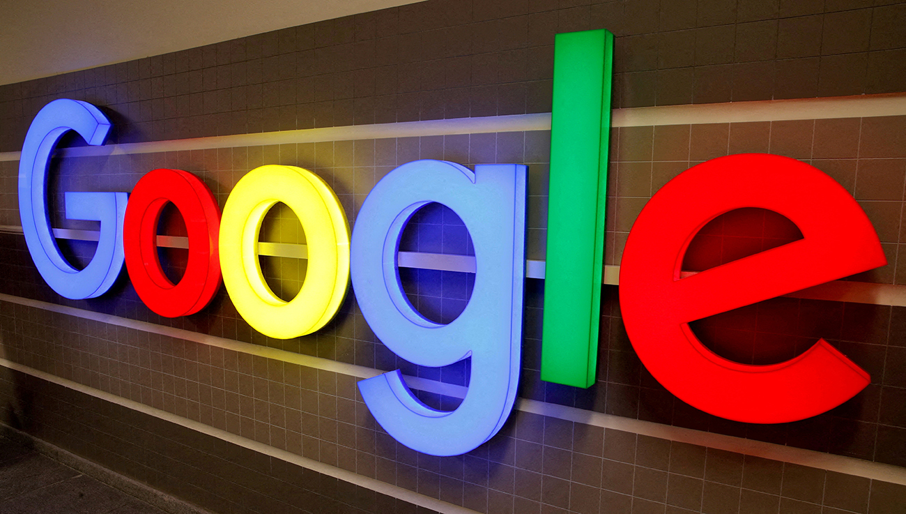 FILE PHOTO: An illuminated Google logo is seen inside an office building in Zurich, Switzerland December 5, 2018.    REUTERS