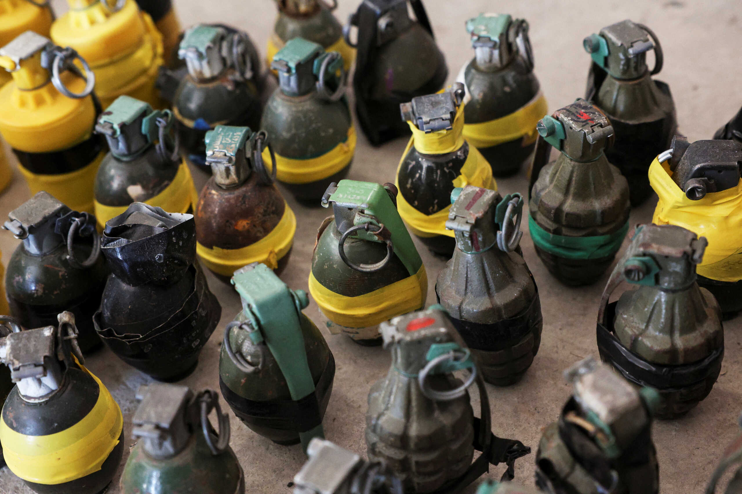 A view shows hand grenades which Israel's army says were left behind by Hamas militants in Israel's southern communities following a deadly infiltration by Hamas gunmen from the Gaza Strip, near Ashdod, Israel, October 20, 2023. REUTERS