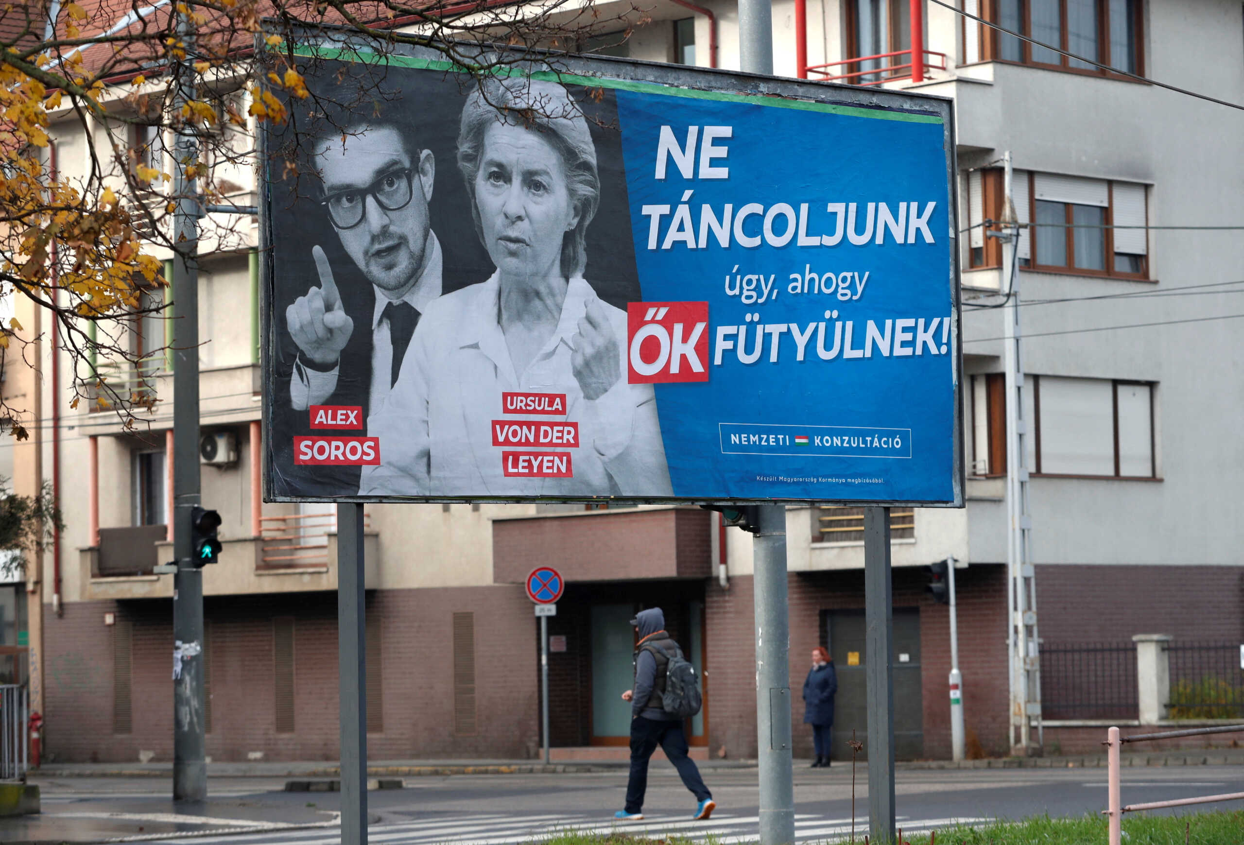 A government billboard shows American philanthropist Alex Soros, son of Hungarian-American financier George Soros and European Commission President Ursula von der Leyen in Budapest, Hungary, November 20, 2023. The billboard reads, "Let's not dance to their tunes". REUTERS