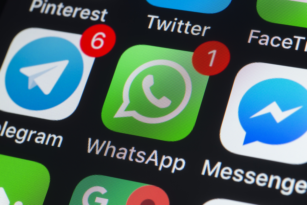 London, UK - July 19, 2018: The buttons of Whatsapp, Messenger, Telegram, Pinterest Twitter, Facetime and other chat apps on the screen of an iPhone.