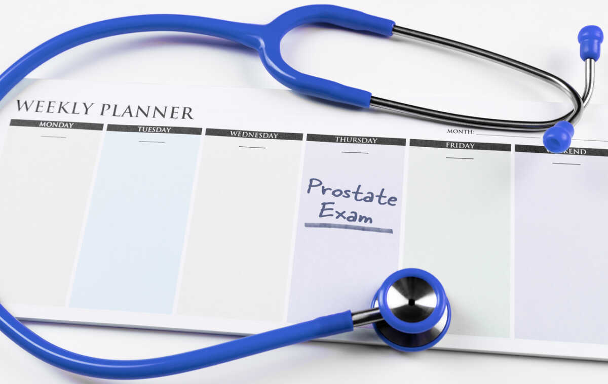 Weekly planner and blue stethoscope.