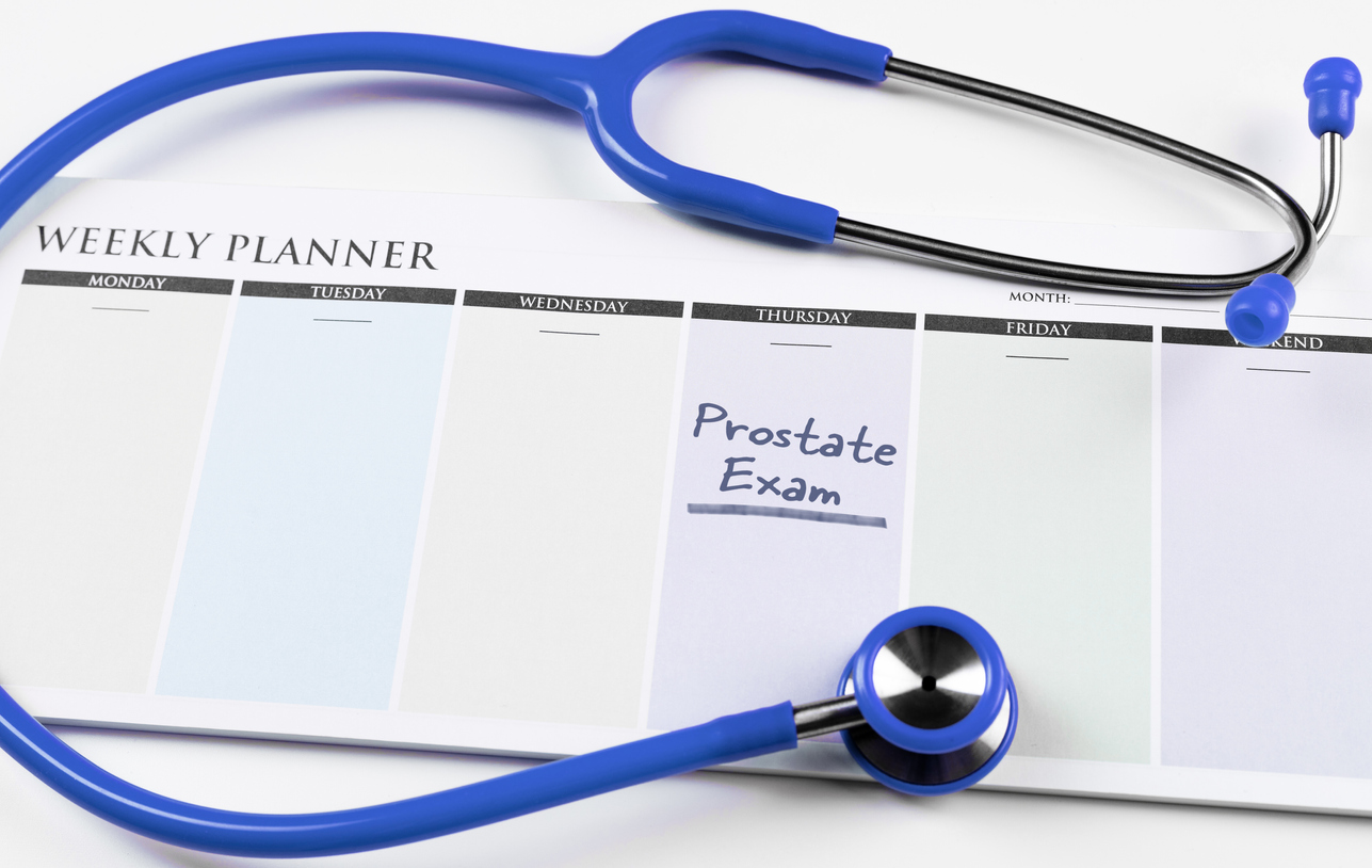 Weekly planner and blue stethoscope.