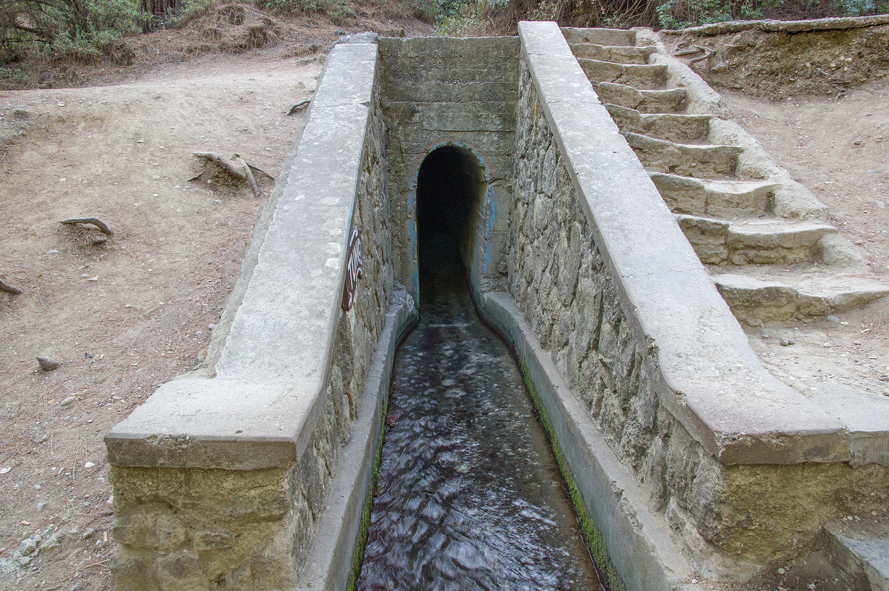 Rhodes Island, Greece. Tunnel at Seven Springs (Epta Piges). The seven bubbling springs generate water, culminating in a small lake that provides habitat to tortoises, eels, crabs and fish.