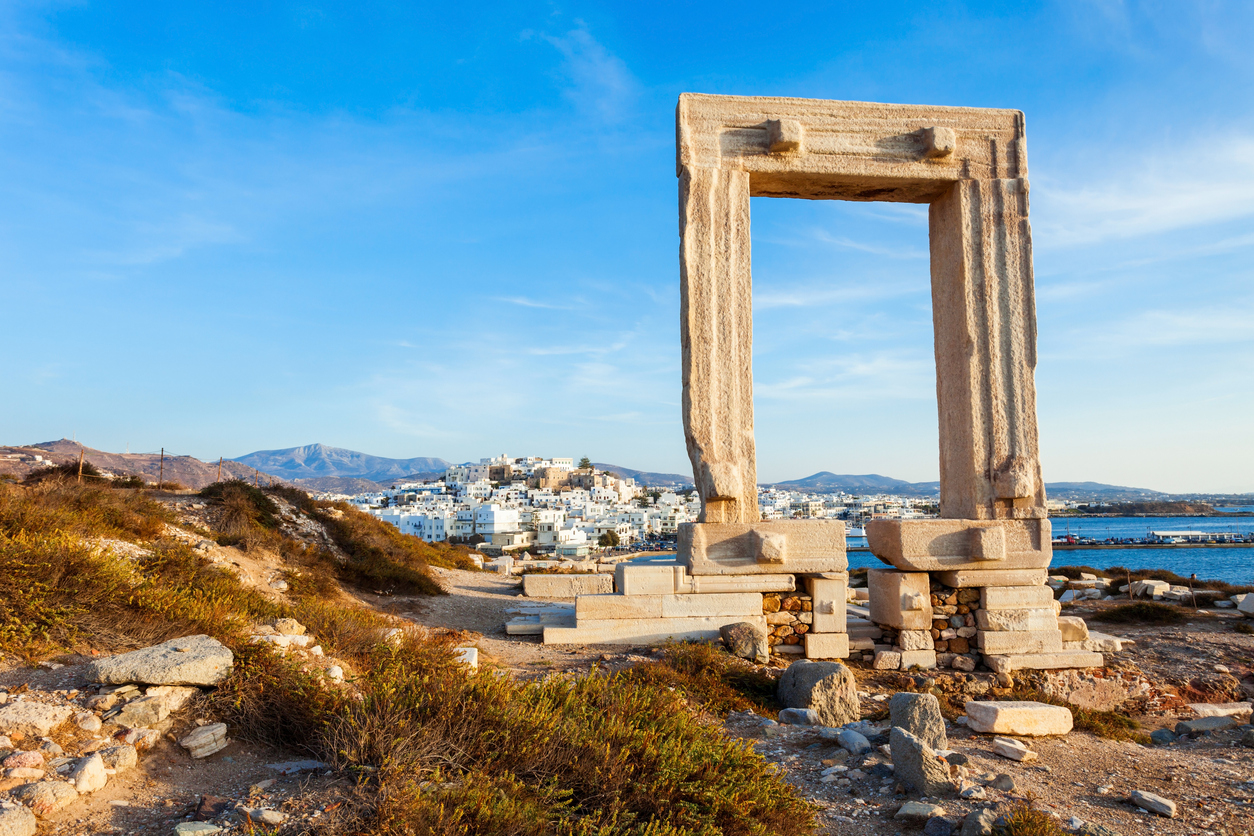 Naxos Portara or Apollo Temple entrance gate on Palatia island near Naxos island in Greece