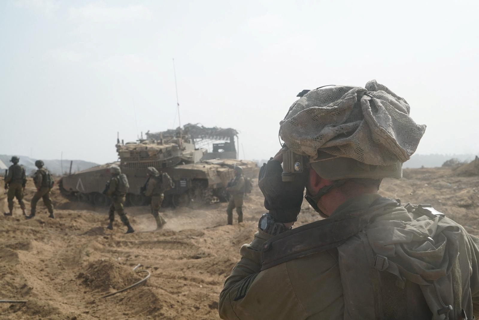 Israeli soldiers take a position amid the ongoing ground operation of the Israeli army against the Palestinian Islamist group Hamas, in the Gaza Strip, in this handout image released by the Israel Defense Forces on November 8, 2023. Israel Defense Forces