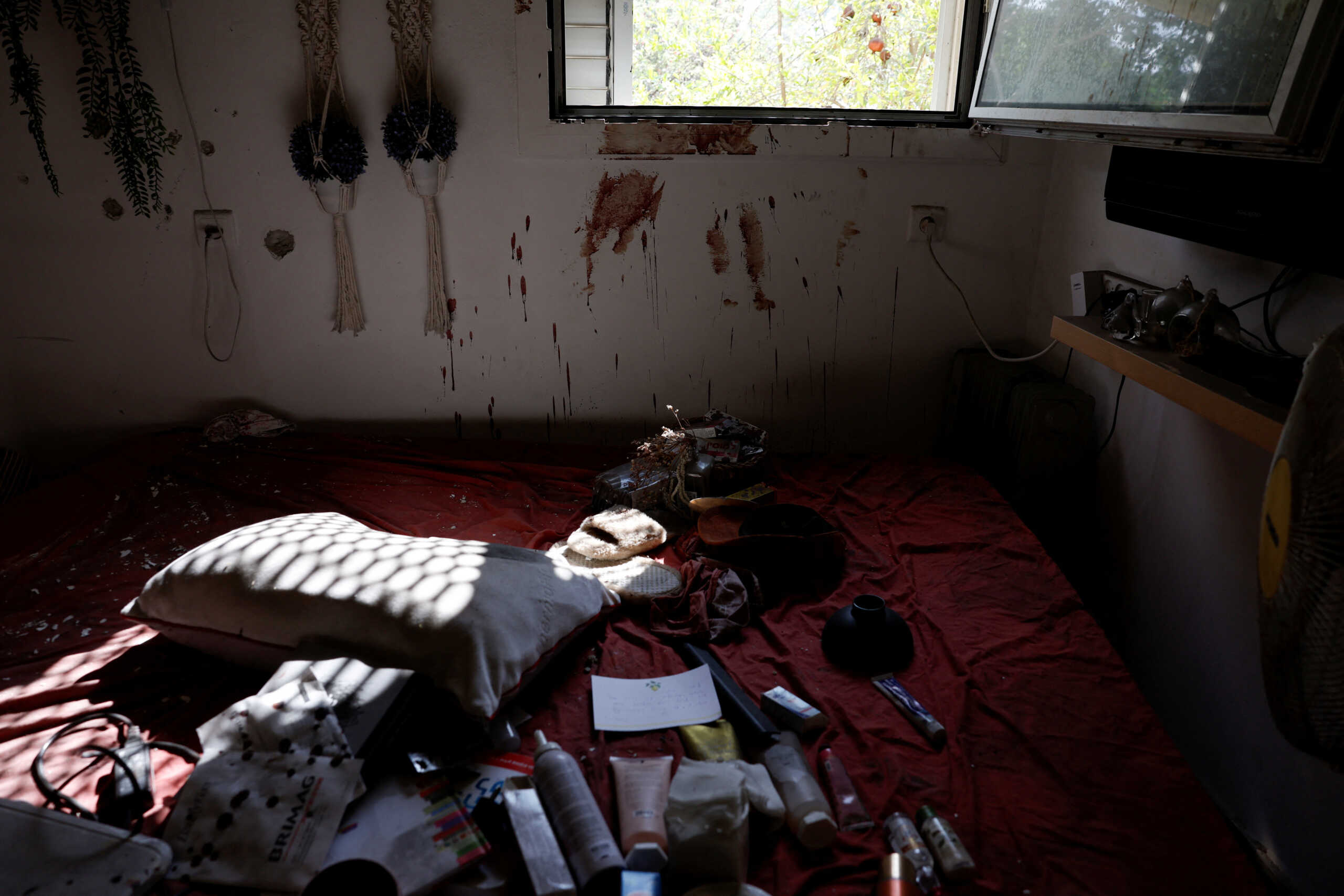 SENSITIVE MATERIAL. THIS IMAGE MAY OFFEND OR DISTURB    A wall is covered in blood, following the deadly October 7 attack by Hamas gunmen from the Gaza Strip, in Kibbutz Kfar Aza, southern Israel November 2, 2023. REUTERS
