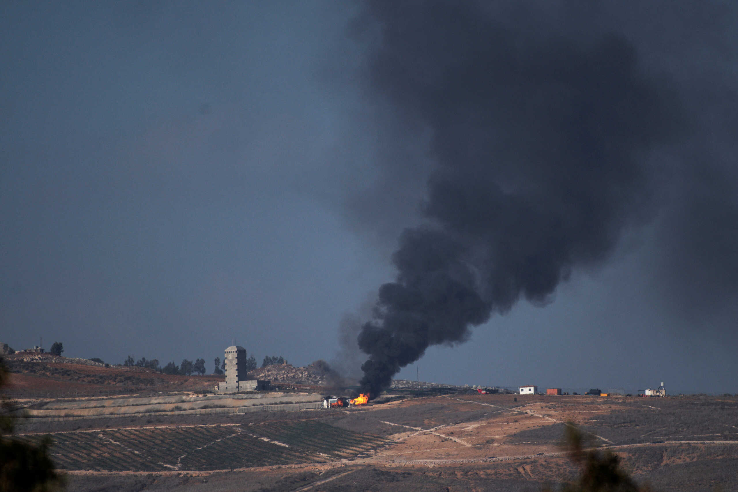 Smoke and fire on the Lebanese side of the Israel-Lebanon border as seen from its Israeli side following shellings by Israel November 23, 2023. REUTERS
