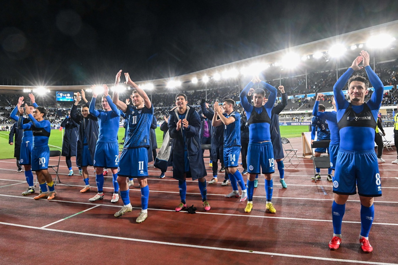 epa10924053 Players of Kazakhstan celebrate with their fans after winning the UEFA EURO 2024 group H qualifying soccer match between Finland and Kazakhstan in Helsinki, Finland, 17 October 2023  EPA