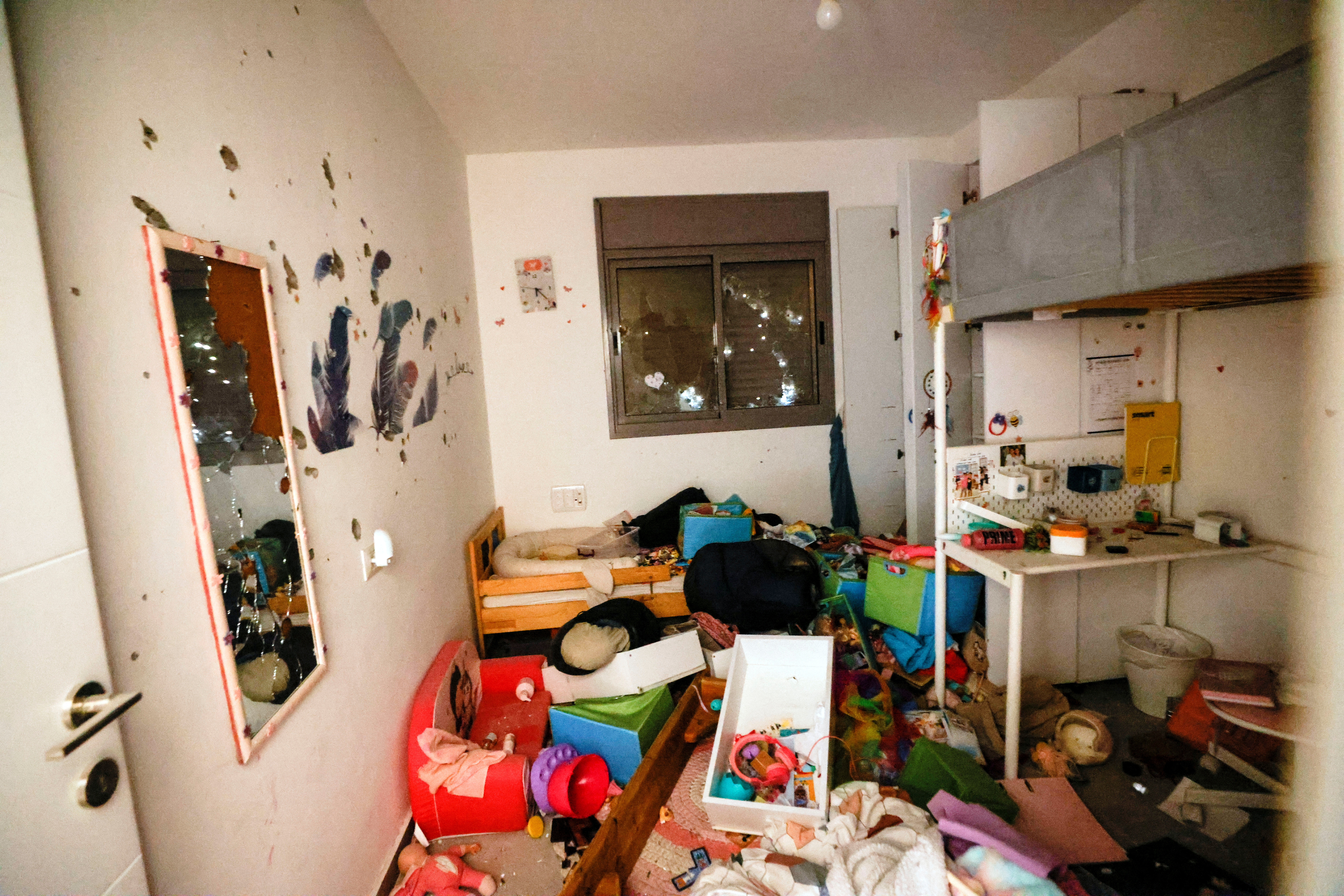 Toys and other belongings are seen inside a damaged family home in Kibbutz Nir Oz following a deadly infiltration by Hamas gunmen from the Gaza Strip, in Kibbutz Nir Oz in southern Israel October 19, 2023. REUTERS