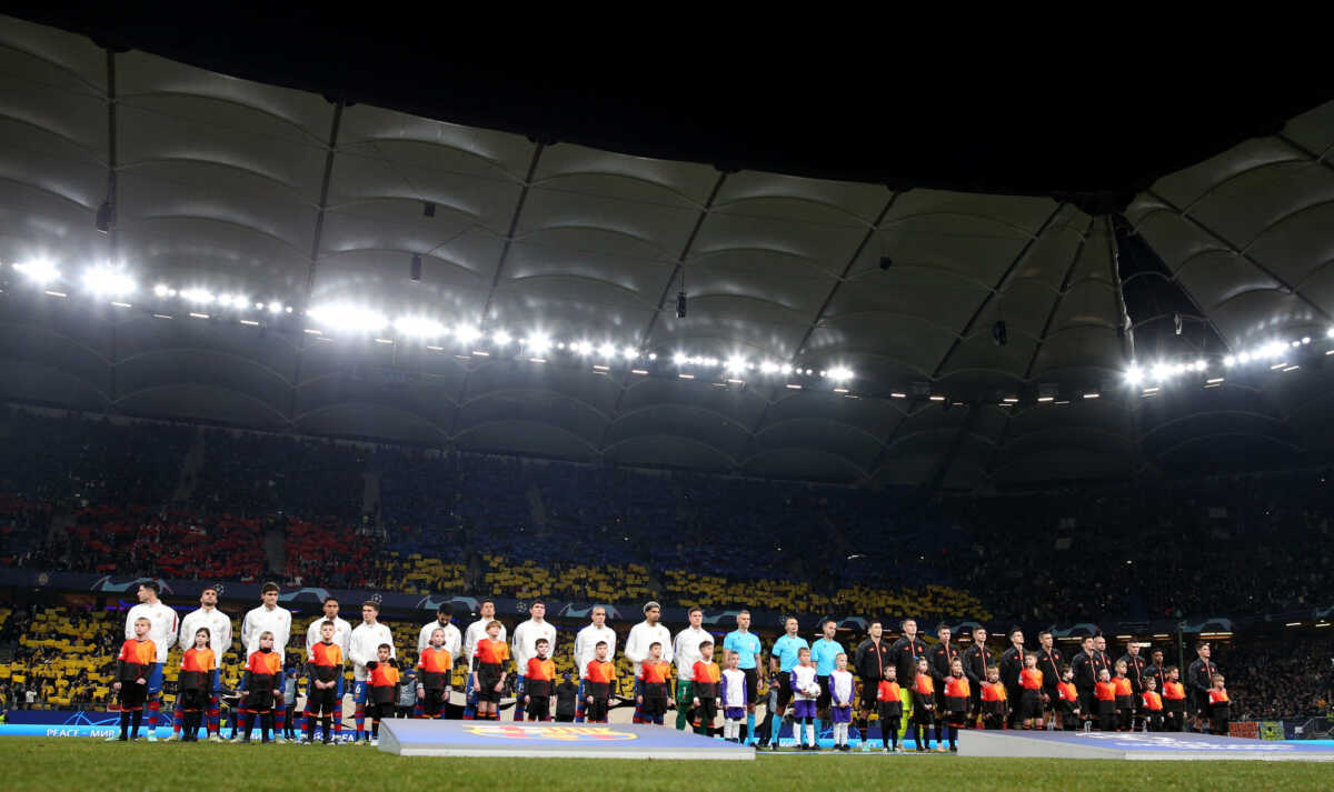 Soccer Football - Champions League - Group H - Shakhtar Donetsk v FC Barcelona - Volksparkstadion, Hamburg, Germany - November 7, 2023 Players and referees line up during the national anthems before the match REUTERS