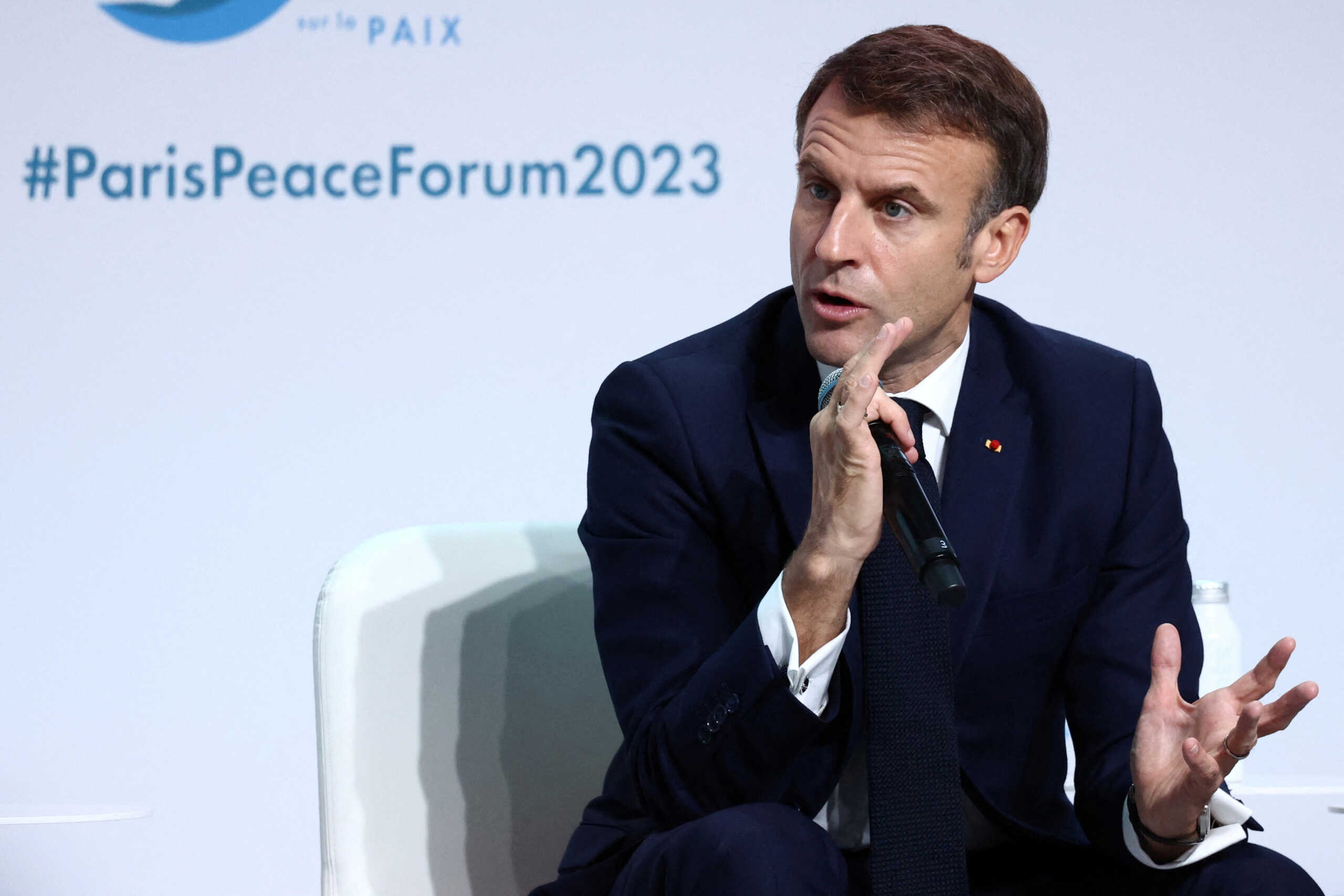 French President Emmanuel Macron speaks during the opening ceremony of the 6th edition of the Paris Peace Forum at the Palais Brongniart in Paris, France, November 10, 2023. REUTERS