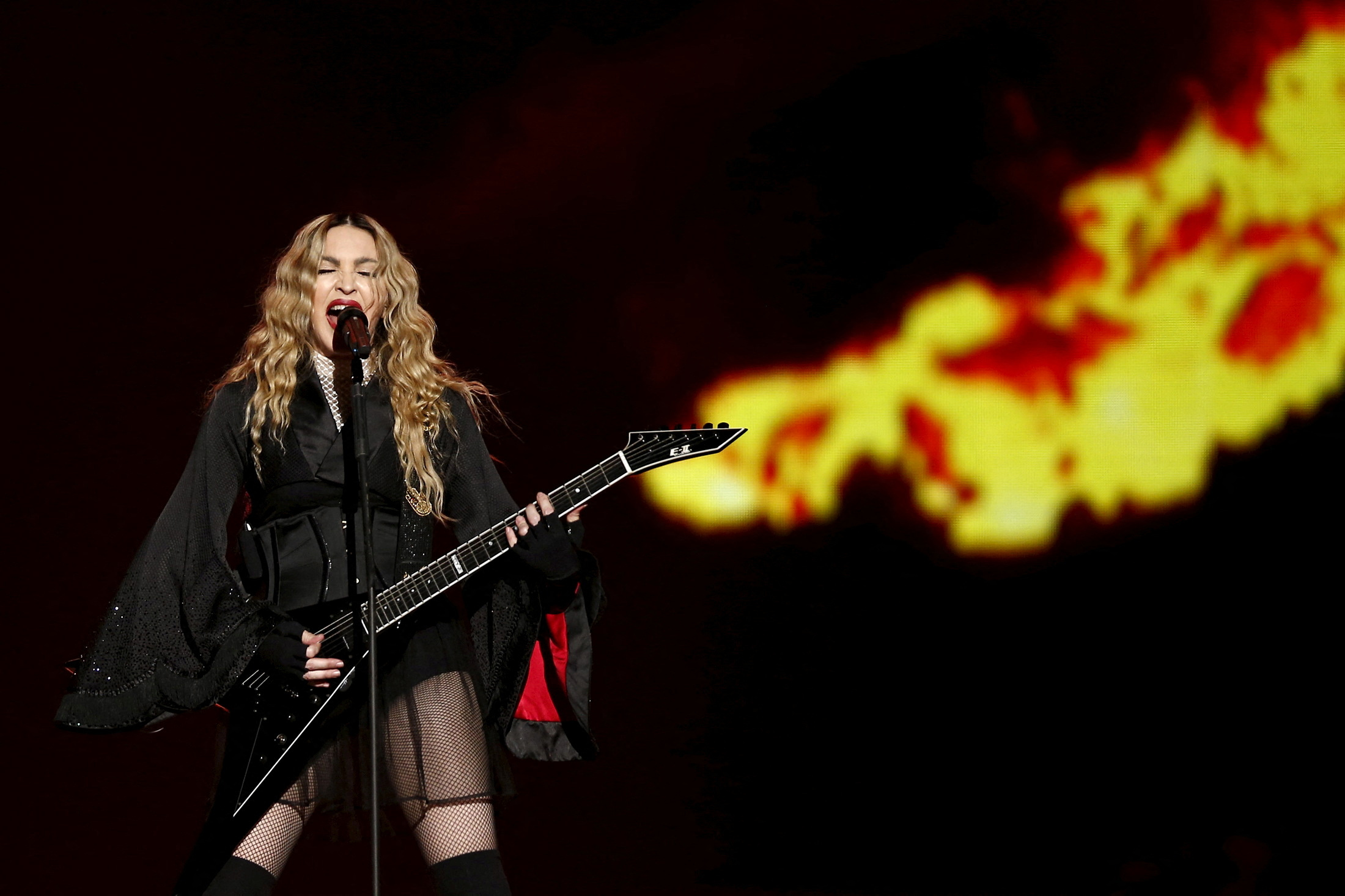 FILE PHOTO: Singer Madonna performs during her concert at the AccorHotels Arena in Paris, France, December 9, 2015, on her Rebel Heart Tour. REUTERS
