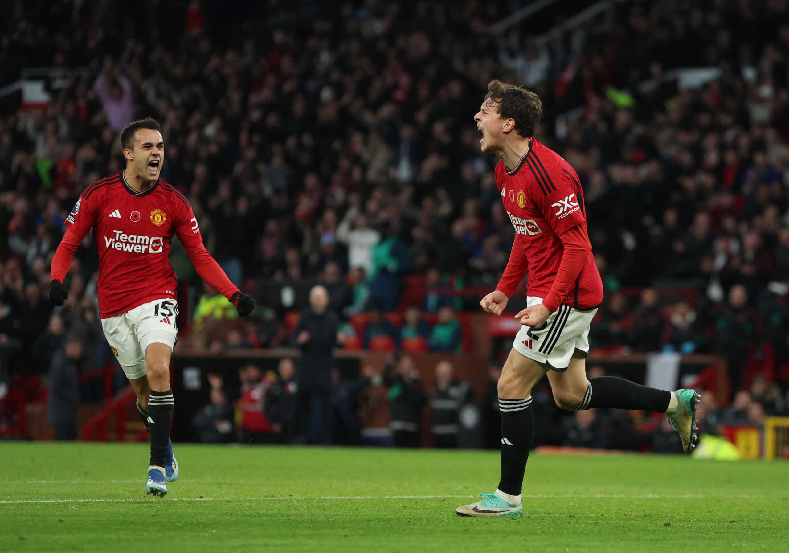 Soccer Football - Premier League - Manchester United v Luton Town - Old Trafford, Manchester, Britain - November 11, 2023 Manchester United's Victor Lindelof celebrates scoring their first goal with Sergio Reguilon REUTERS