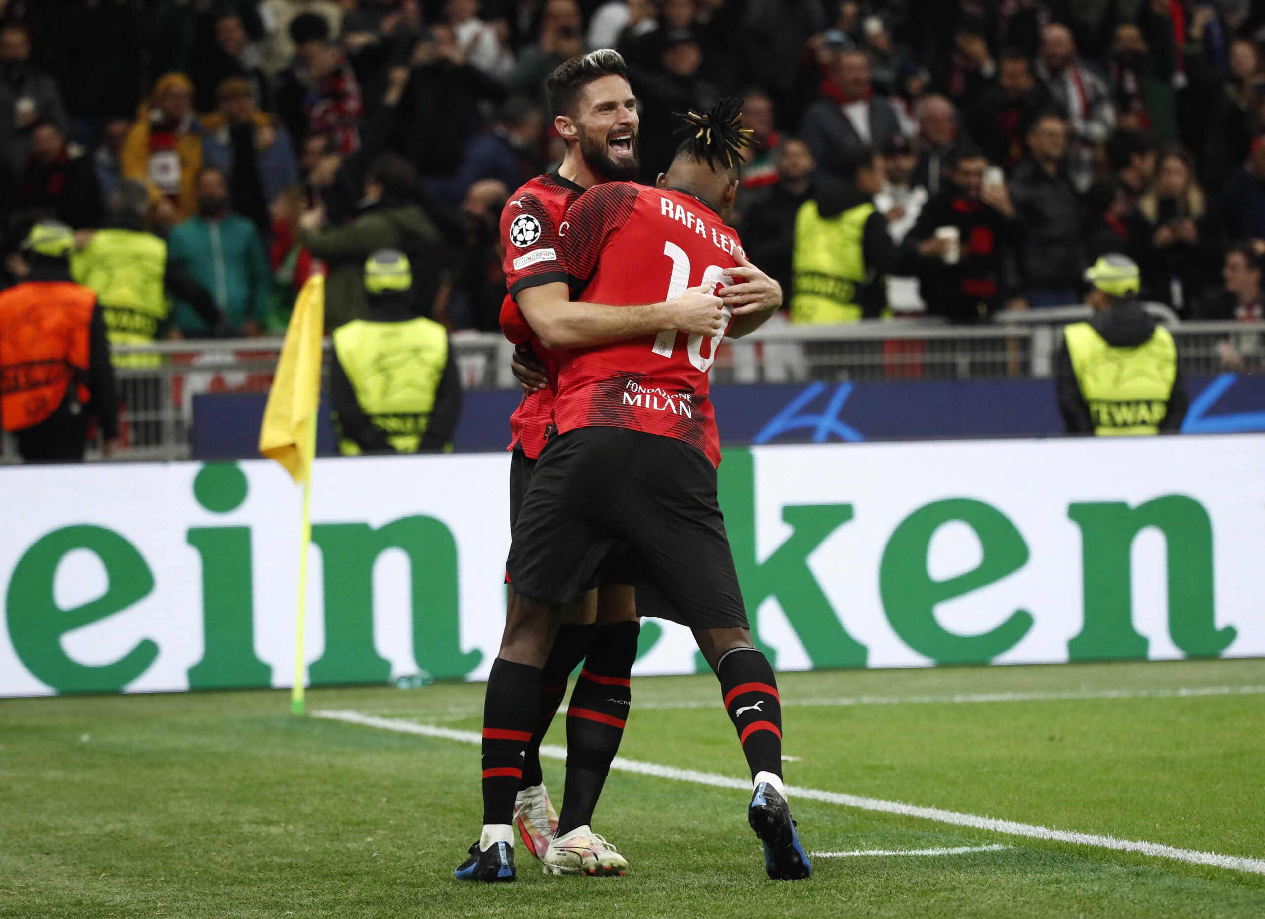 Soccer Football - Champions League - Group F - AC Milan v Paris St Germain - San Siro, Milan, Italy - November 7, 2023 AC Milan's Olivier Giroud celebrates scoring their second goal with Rafael Leao REUTERS