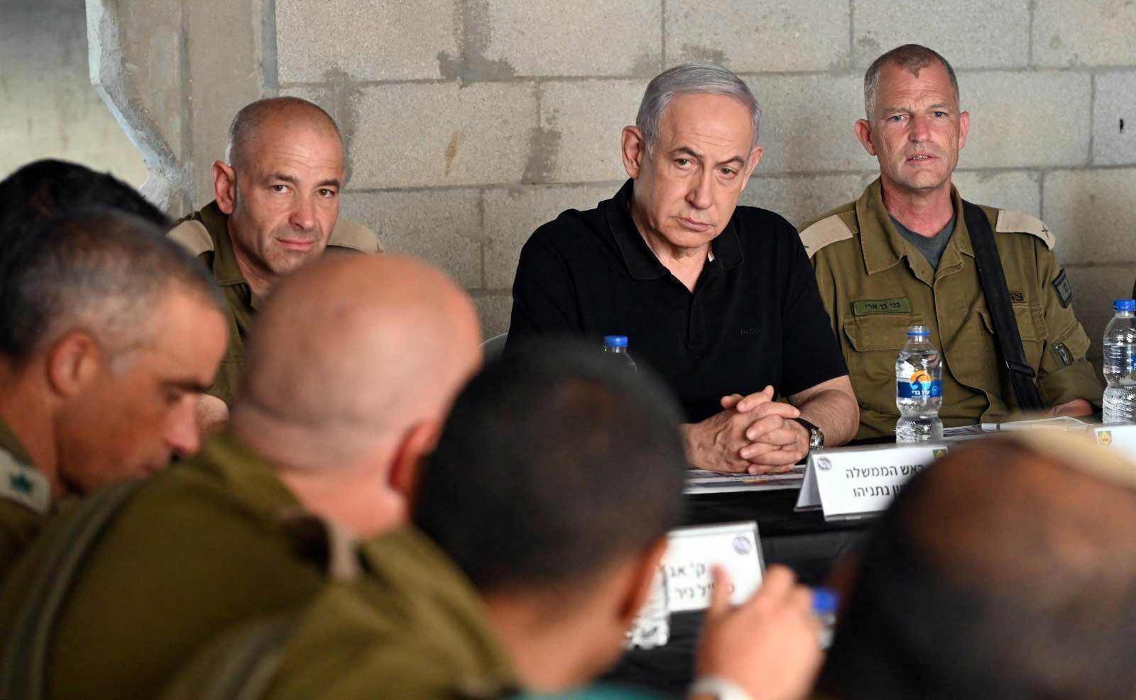 Israeli Prime Minister Benjamin Netanyahu meets with soldiers as he visits an Israeli army base in Tze'elim, Israel November 7, 2023.    Israeli Government Press Office