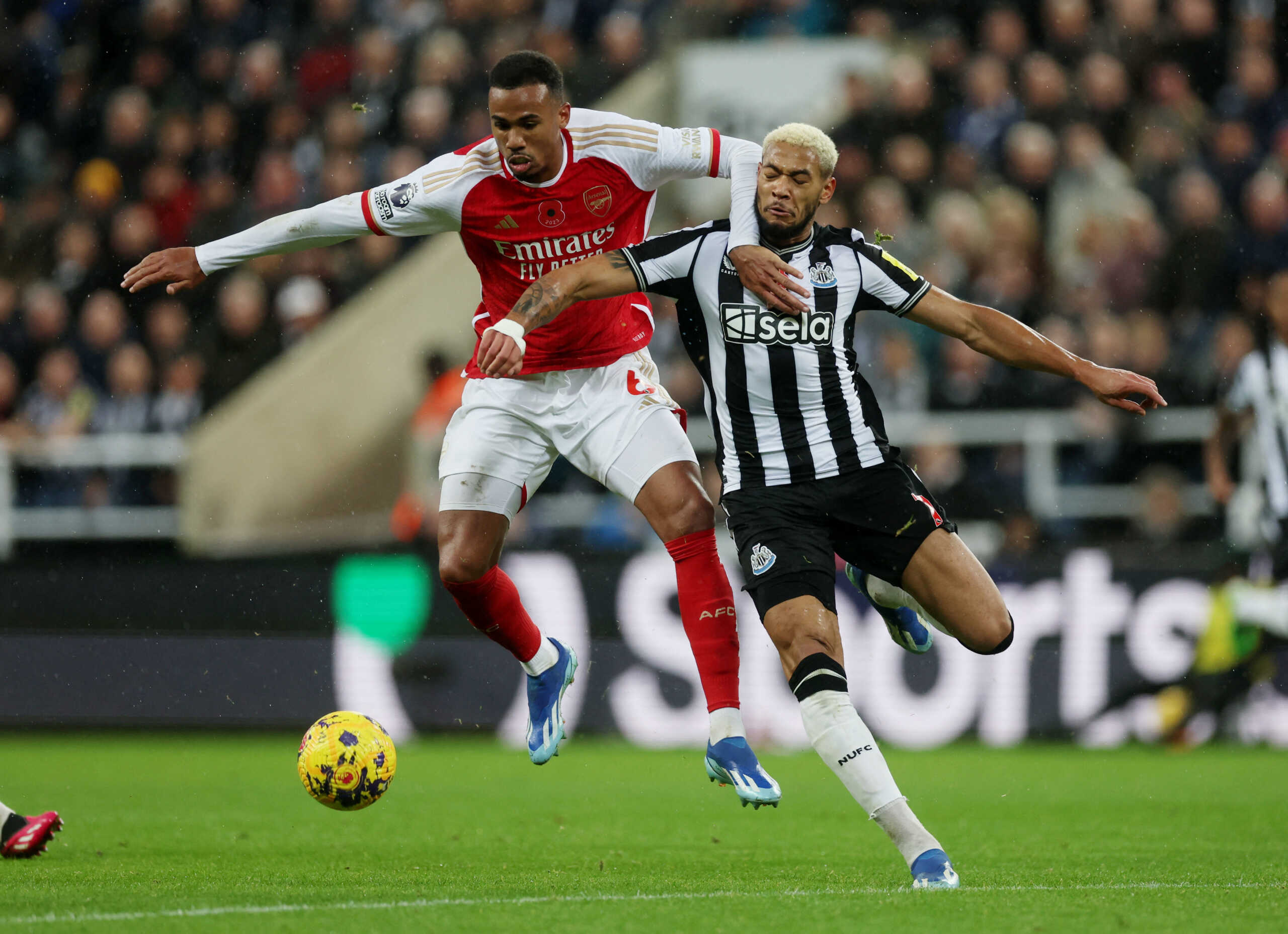 Soccer Football - Premier League - Newcastle United v Arsenal - St James' Park, Newcastle, Britain - November 4, 2023 Arsenal's Gabriel in action with Newcastle United's Joelinton Action Images via Reuters