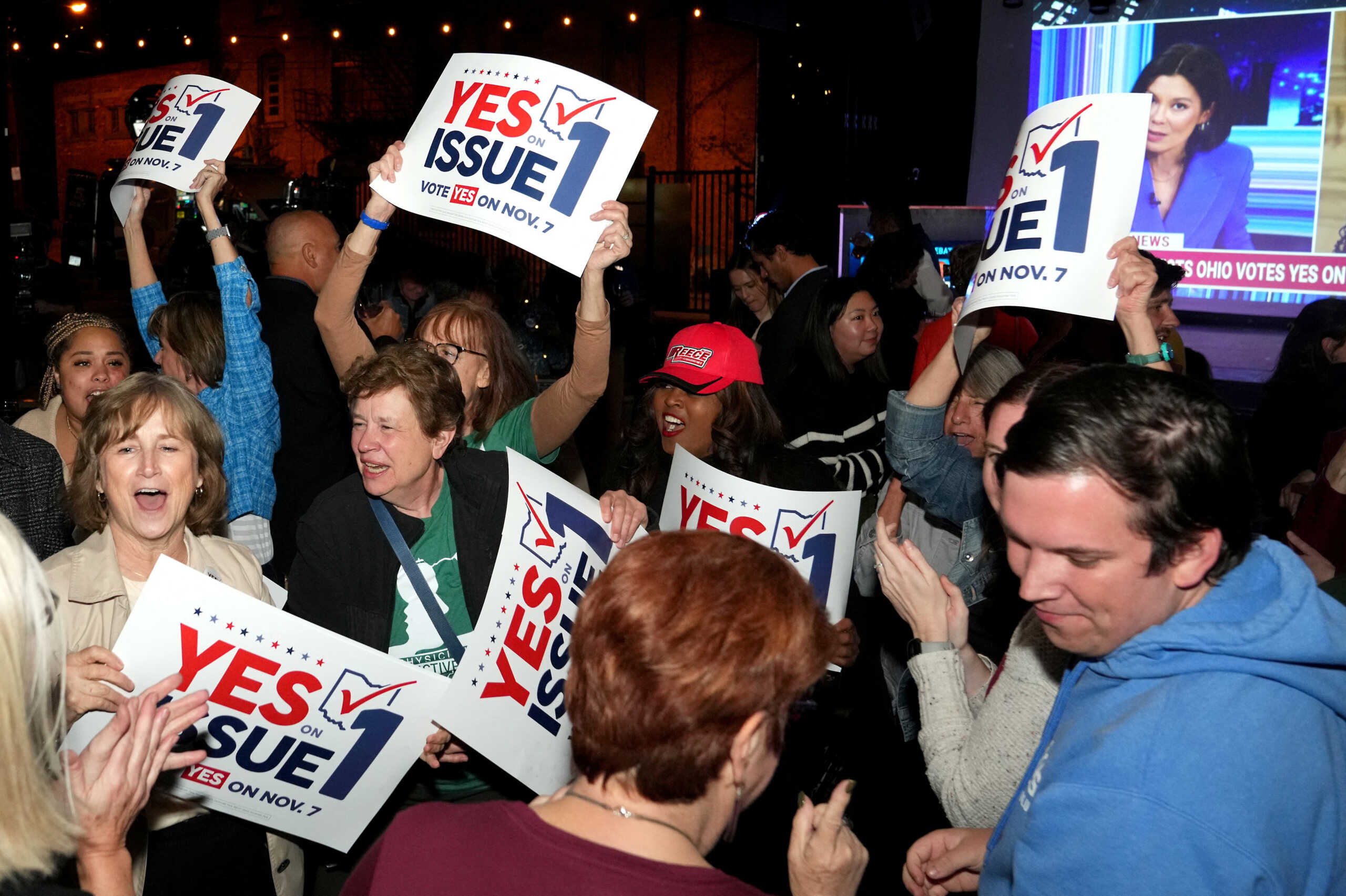 Supporters react to the passage of Ohio Issue 1, a ballot measure to amend the state constitution and establish a right to abortion, at an election night party hosted by the Hamilton County Democratic Party at Knox Joseph Distillery in the Over-the-Rhine neighborhood of Cincinnati, Ohio, U.S. November 7, 2023.   Kareem Elgazzar