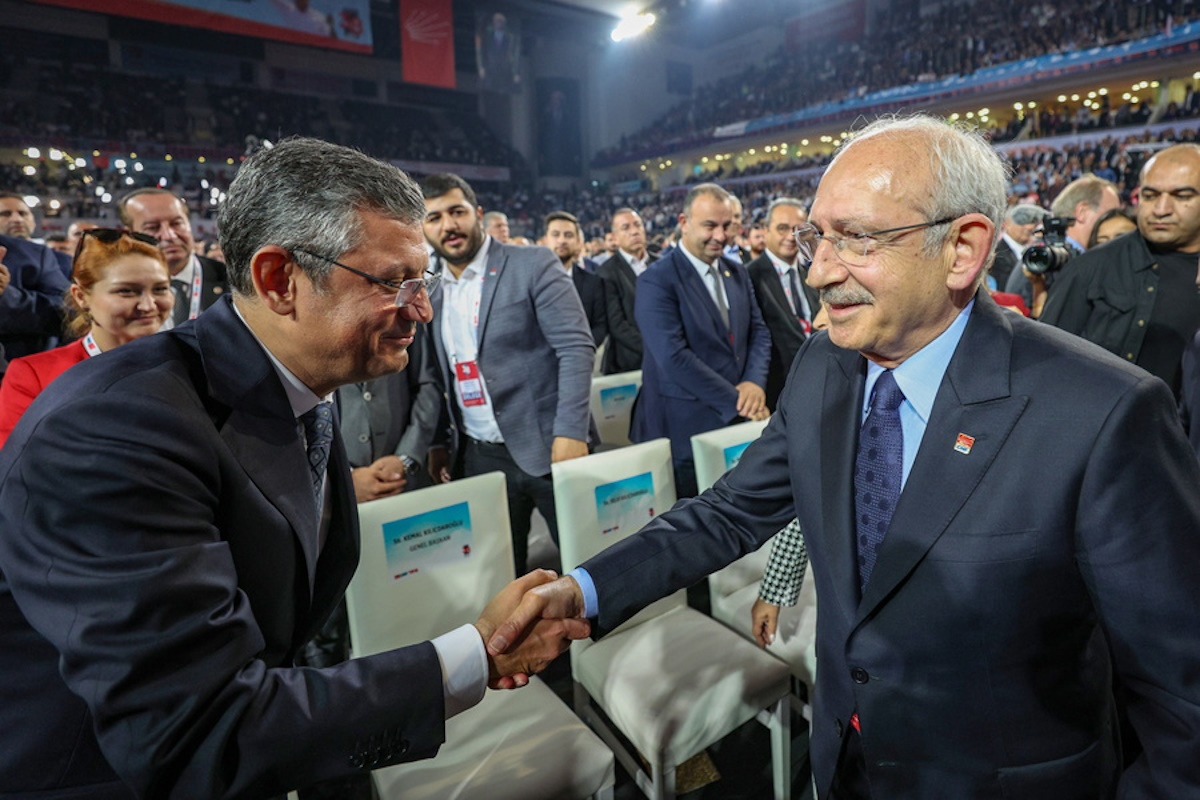 epa10958793 A handout photo made available by the CHP press office shows Kemal Kilicdaroglu (R), former leader of the opposition Republican People's Party (CHP), shaking hands with Ozgur Ozel (L), new leader of the opposition Republican People's Party (CHP) as they attend their regular congress in Ankara, Turkey, 04 November 2023. The primary opposition Republican People's Party (CHP), which will elect its new chairman for the next term, gathered for its 38th regular congress on 04 to 05 November. Ozgur Ozel was elected as new leader of the party.  EPA