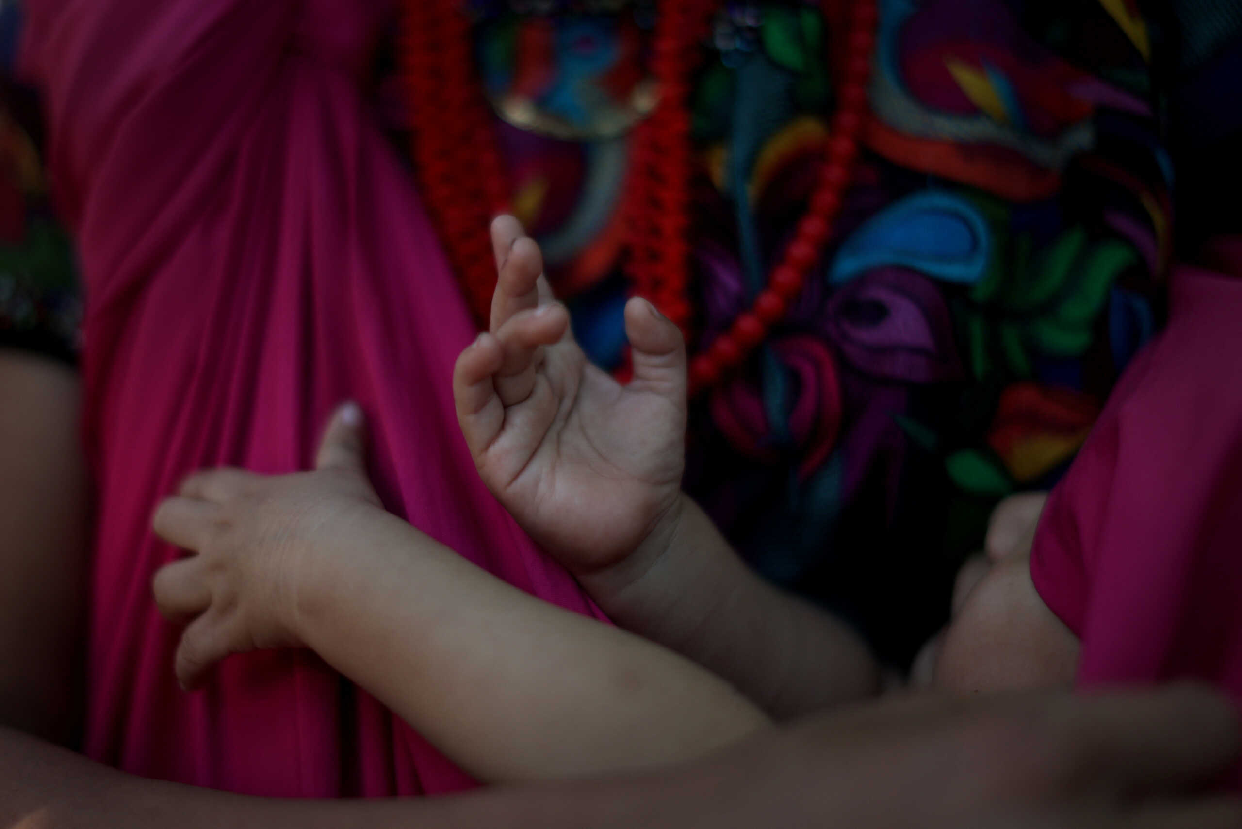 Gabina Albina Sisto, 22, holds her baby in El Aguacate village in Baja Verapaz, Guatemala August 16, 2023. El Aguacate, with a population of about 500 and barely accessible by road, sits within Central America's Dry Corridor, a region that has suffered a series of debilitating droughts and storms over the past decade. Such weather extremes are linked to climate change and hit subsistence farmers hard in the Dry Corridor, an already-difficult region for agriculture, according to the U.N.'s Intergovernmental Panel on Climate Change (IPCC). Without irrigation systems in many isolated villages, farmers depend solely on the rain - and when it doesn't come, their crops often fail.     REUTERS