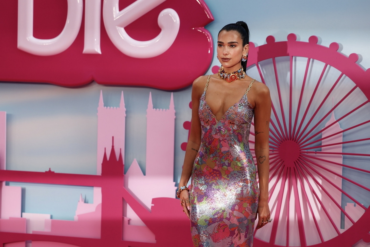 epa10742460 British-Albanian singer Dua Lipa poses on the pink carpet at the European premiere of 'Barbie' in central London, Britain, 12 July 2023. The film will be released in cinemas from 21 July 2023.  EPA