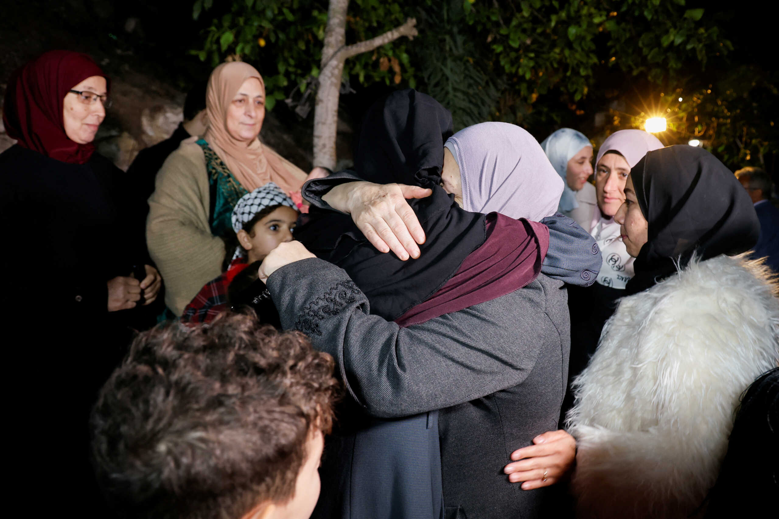 Family members welcome released Palestinian prisoner Fatima Amarneh, amid a hostages-prisoners swap deal between Hamas and Israel, near Jenin in the Israeli-occupied West Bank November 25, 2023. REUTERS