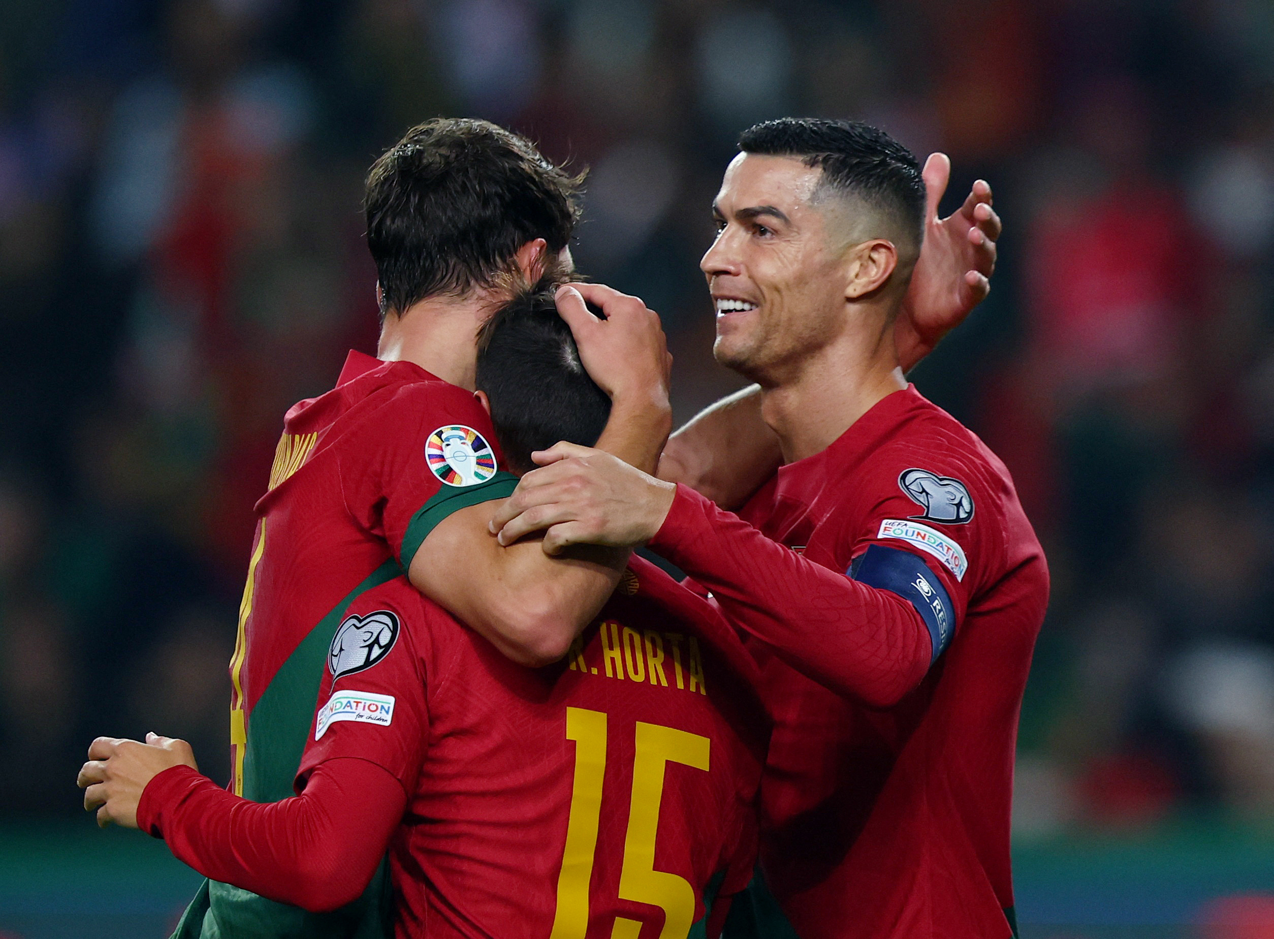 Soccer Football - Euro 2024 Qualifier - Group J - Portugal v Iceland - Estadio Jose Alvalade, Lisbon, Portugal - November 19, 2023  Portugal's Ricardo Horta celebrates scoring their second goal with Cristiano Ronaldo REUTERS