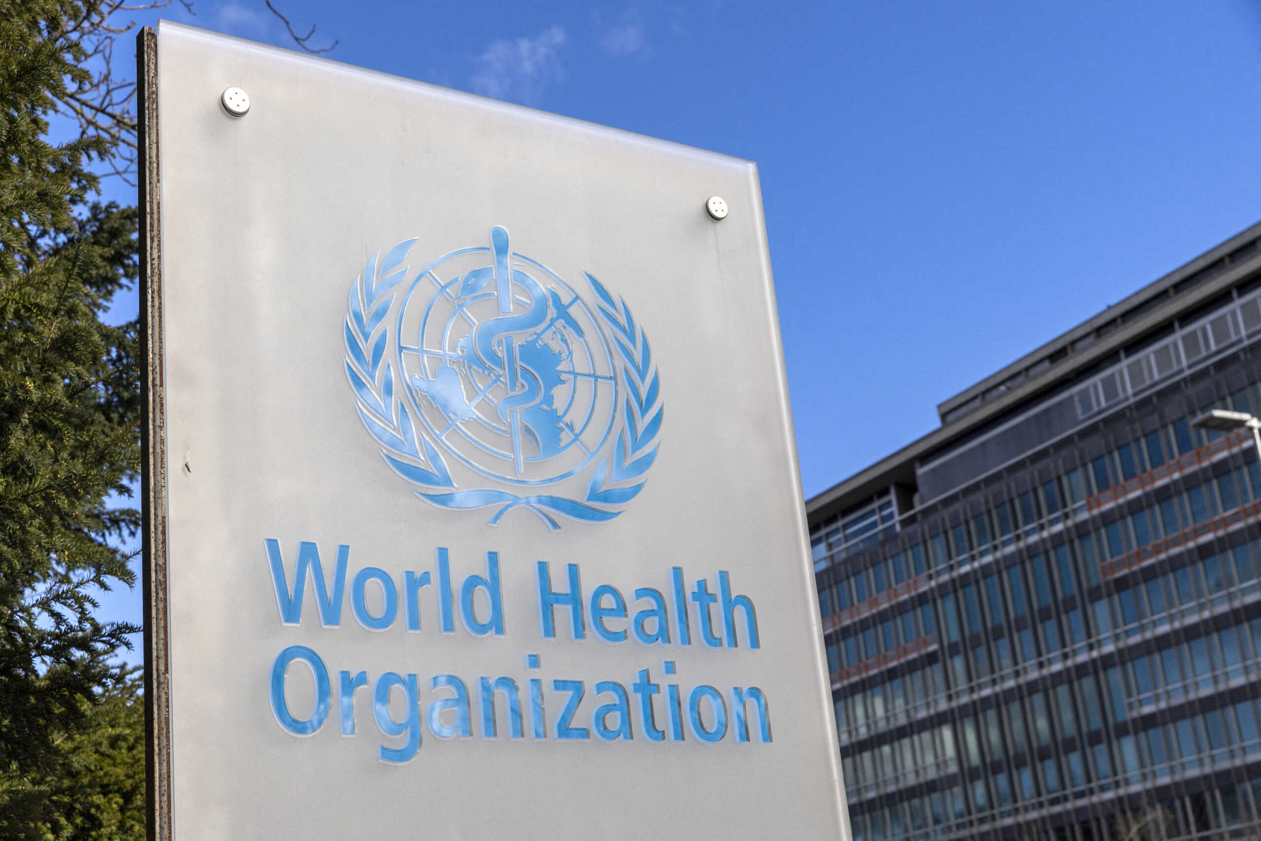FILE PHOTO: The World Health Organisation (WHO) logo is seen near its headquarters in Geneva, Switzerland, February 2, 2023. REUTERS
