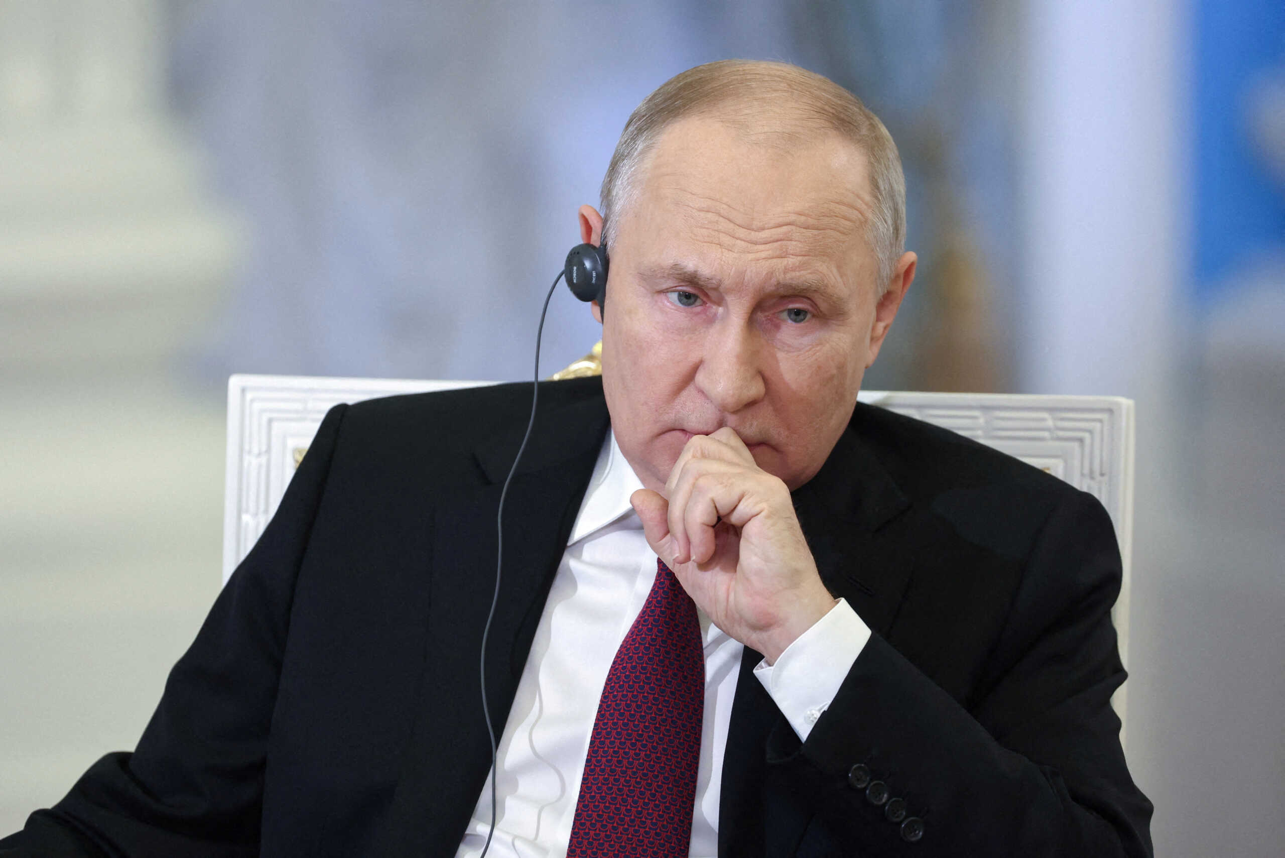 FILE PHOTO: Russian President Vladimir Putin attends an interview with China Media Group anchor Wang Guan at the Kremlin in Moscow, Russia, in this image released October 16, 2023. Sputnik