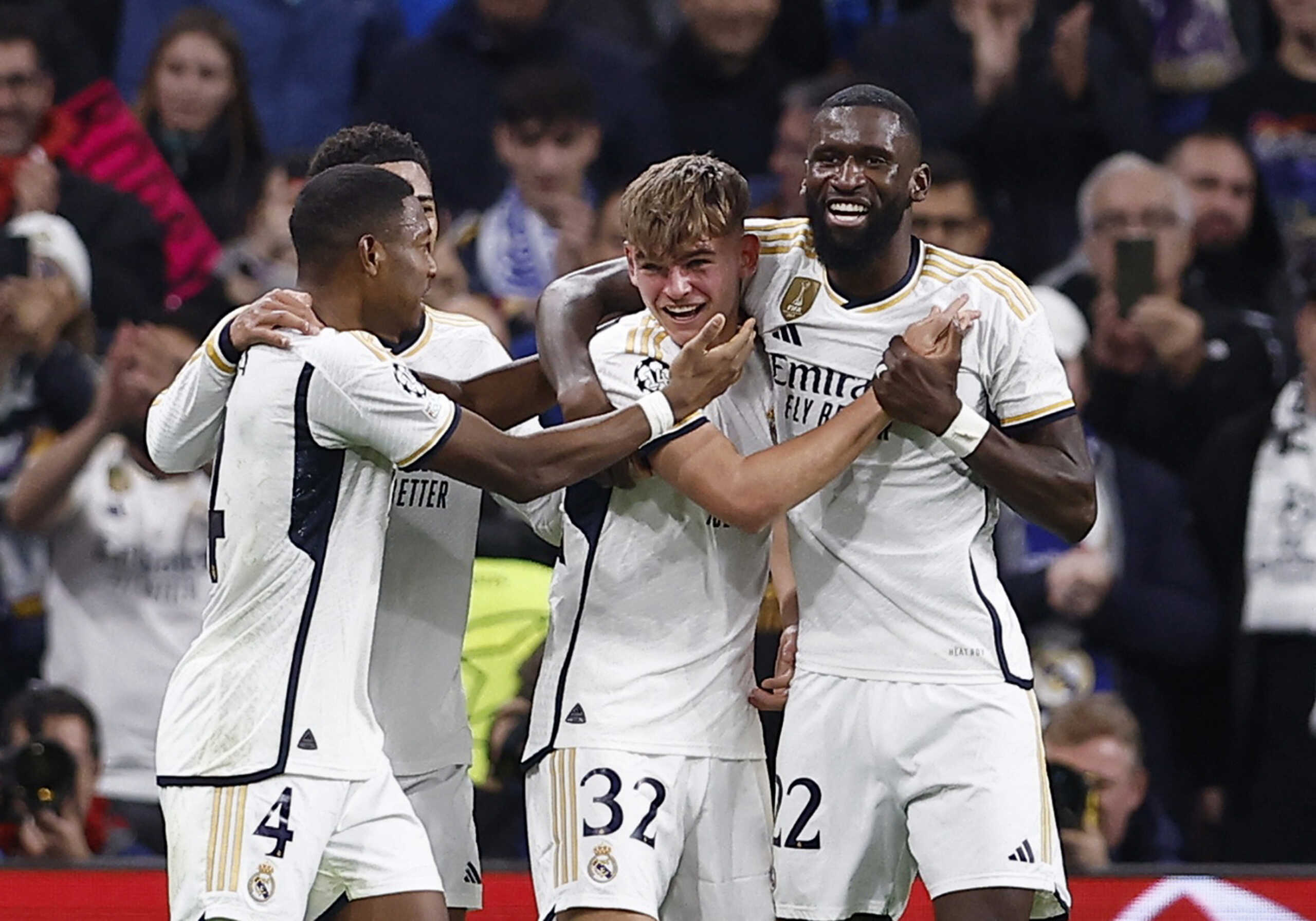 Soccer Football - Champions League - Group C - Real Madrid v Napoli - Santiago Bernabeu, Madrid, Spain - November 29, 2023 Real Madrid's Nico Paz celebrates scoring their third goal with teammates REUTERS