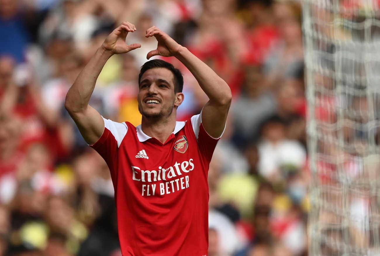 epa09966543 Cedric Soares of Arsenal celebrates after scoring the 3-1 lead during the English Premier League soccer match between Arsenal FC and Everton FC in London, Britain, 22 May 2022.  EPA