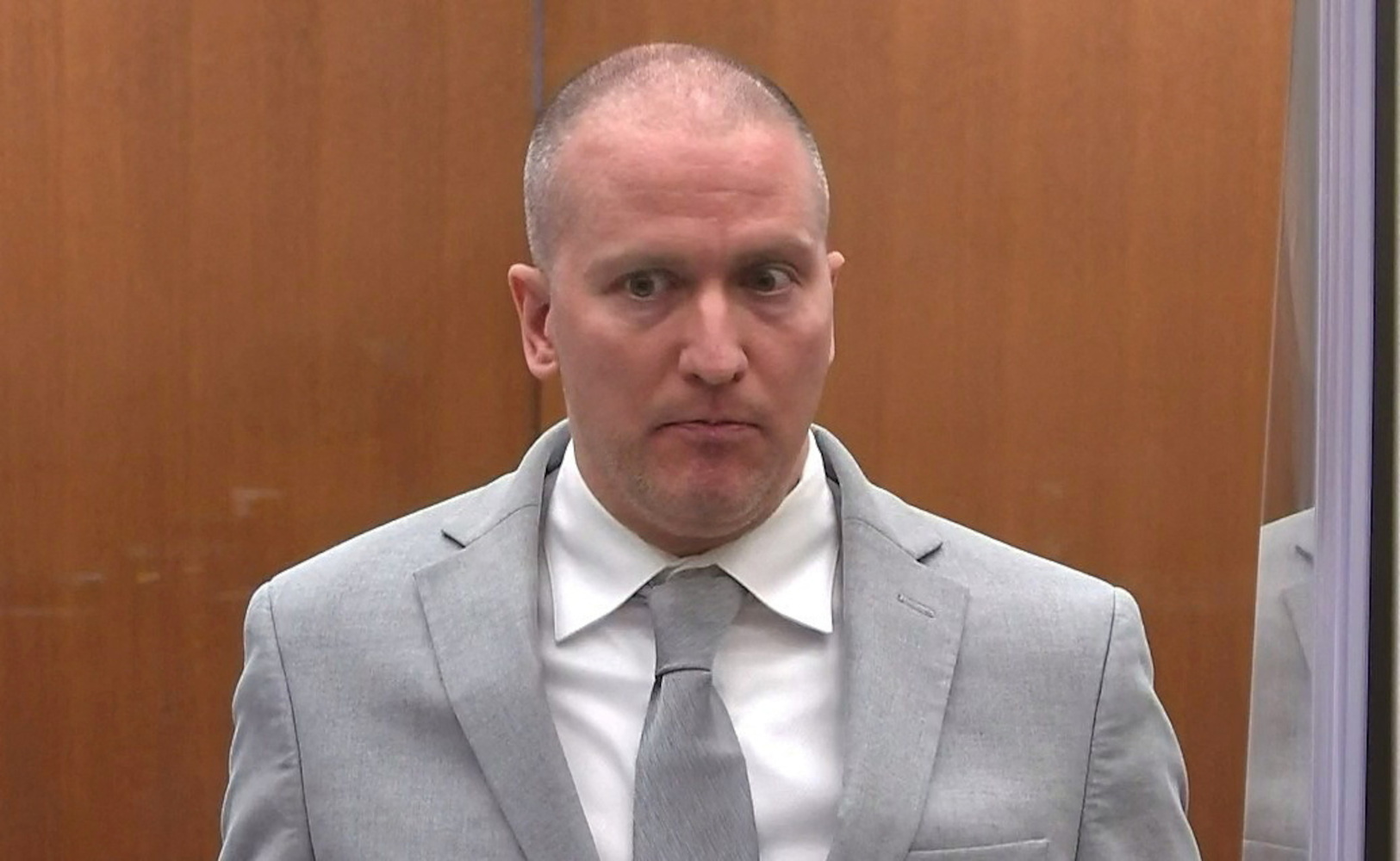 FILE PHOTO: Former Minneapolis police officer Derek Chauvin addresses his sentencing hearing and the judge as he awaits his sentence after being convicted of murder in the death of George Floyd in Minneapolis, Minnesota, U.S. June 25, 2021 in a still image from video. Pool via REUTERS