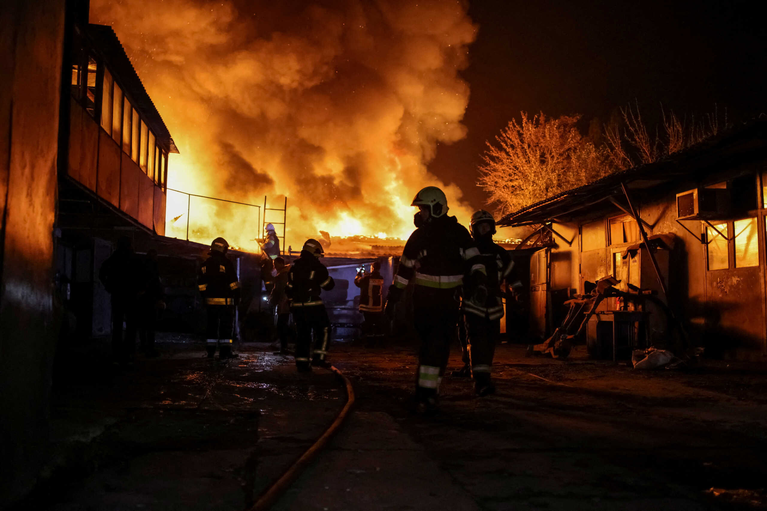 Emergency personnel work at a site of a Russian drone strike, amid Russia's attack on Ukraine, in Kharkiv, Ukraine November 3, 2023. REUTERS