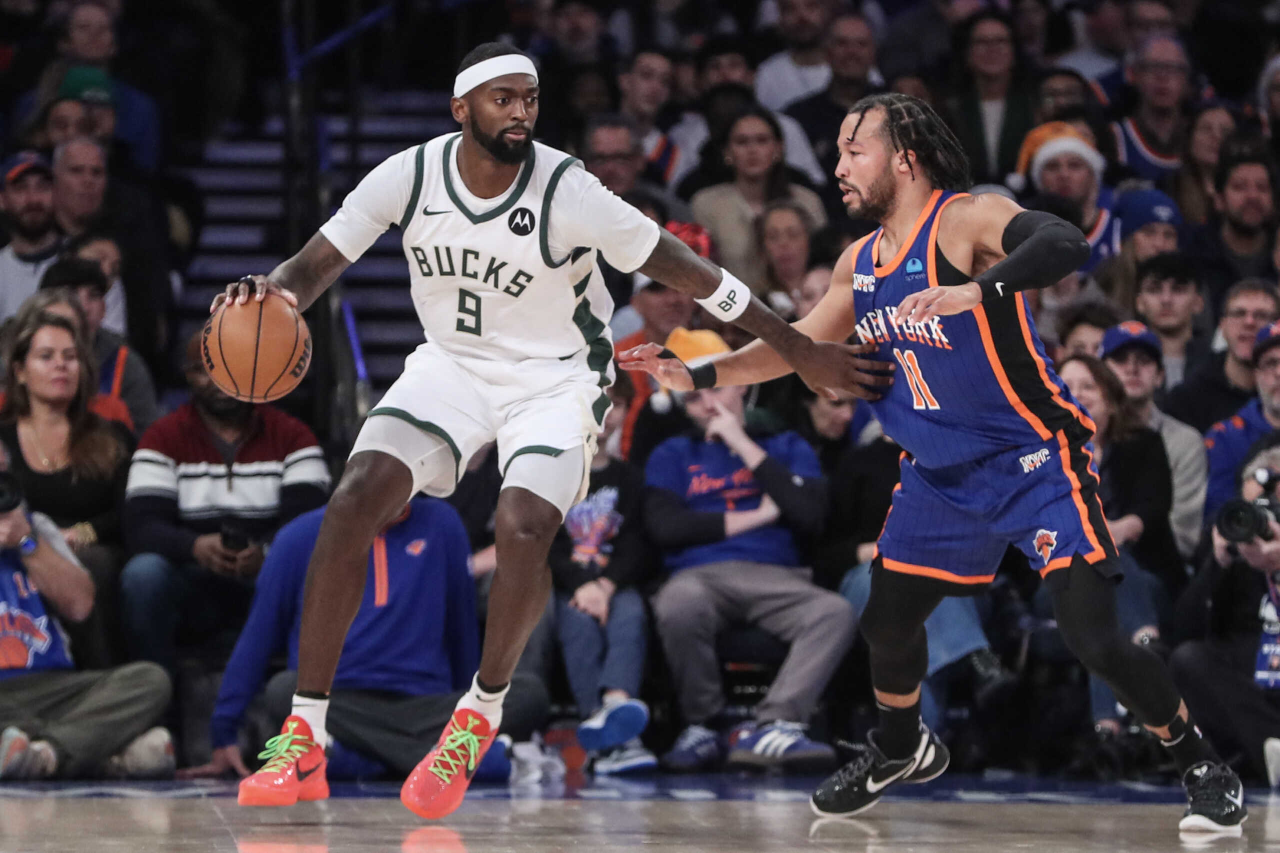 Dec 23, 2023; New York, New York, USA;  Milwaukee Bucks forward Bobby Portis (9) looks to drive past New York Knicks guard Jalen Brunson (11) in the first quarter at Madison Square Garden. Mandatory Credit: Wendell Cruz-USA TODAY Sports