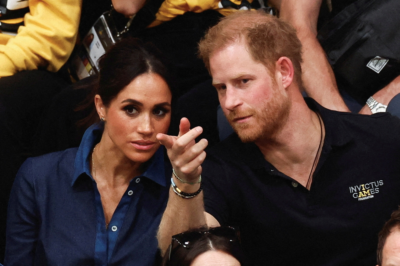 FILE PHOTO: FILE PHOTO: Britain's Prince Harry, Duke of Sussex and his wife Meghan, Duchess of Sussex, attend the sitting volleyball finals at the 2023 Invictus Games, an international multi-sport event for injured soldiers, in Duesseldorf, Germany September 15, 2023. REUTERS